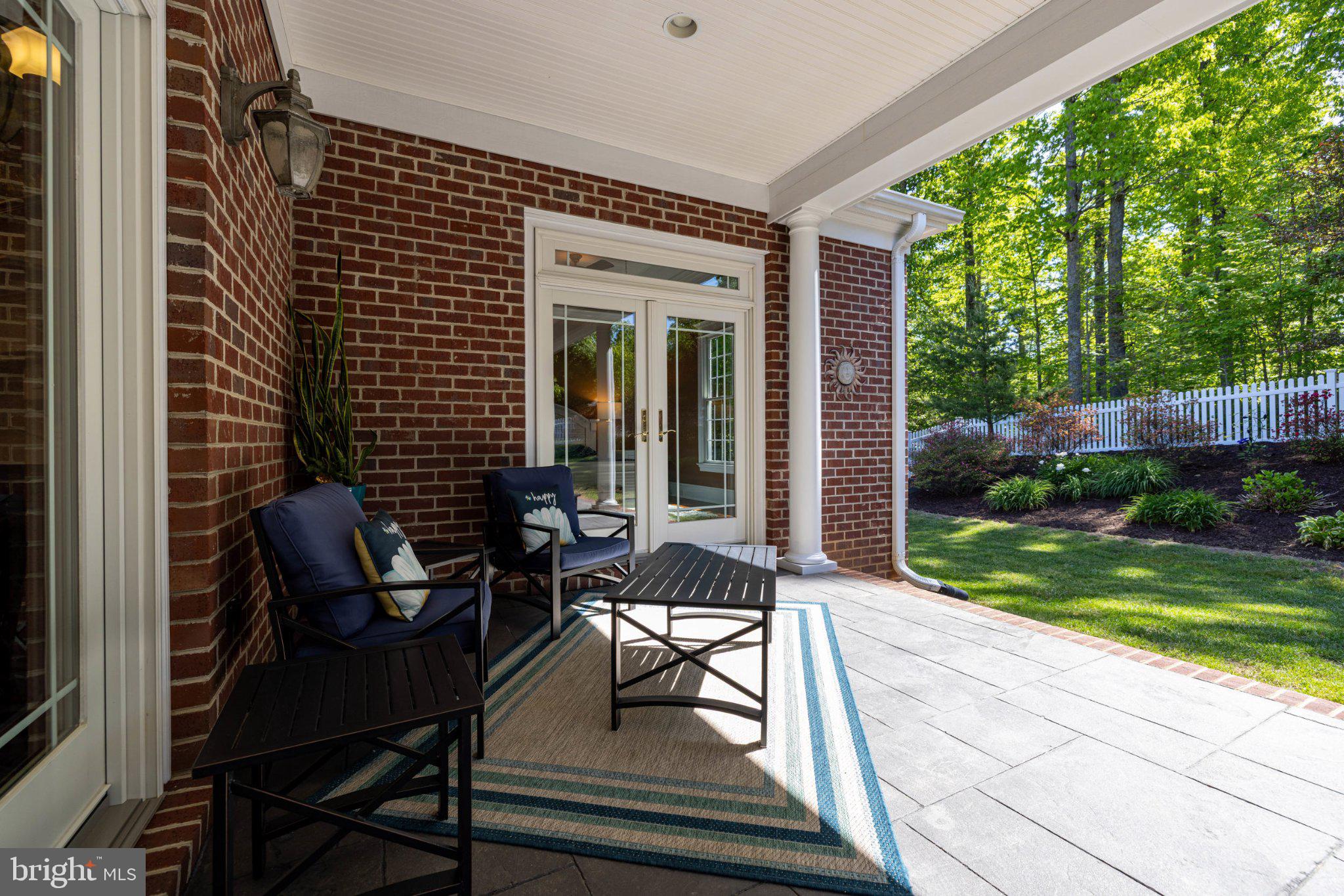 246 Lawsons Farm Circle Ruckersville, VA 22968 - Photo 105 of 130 Inviting porch with lush greenery.