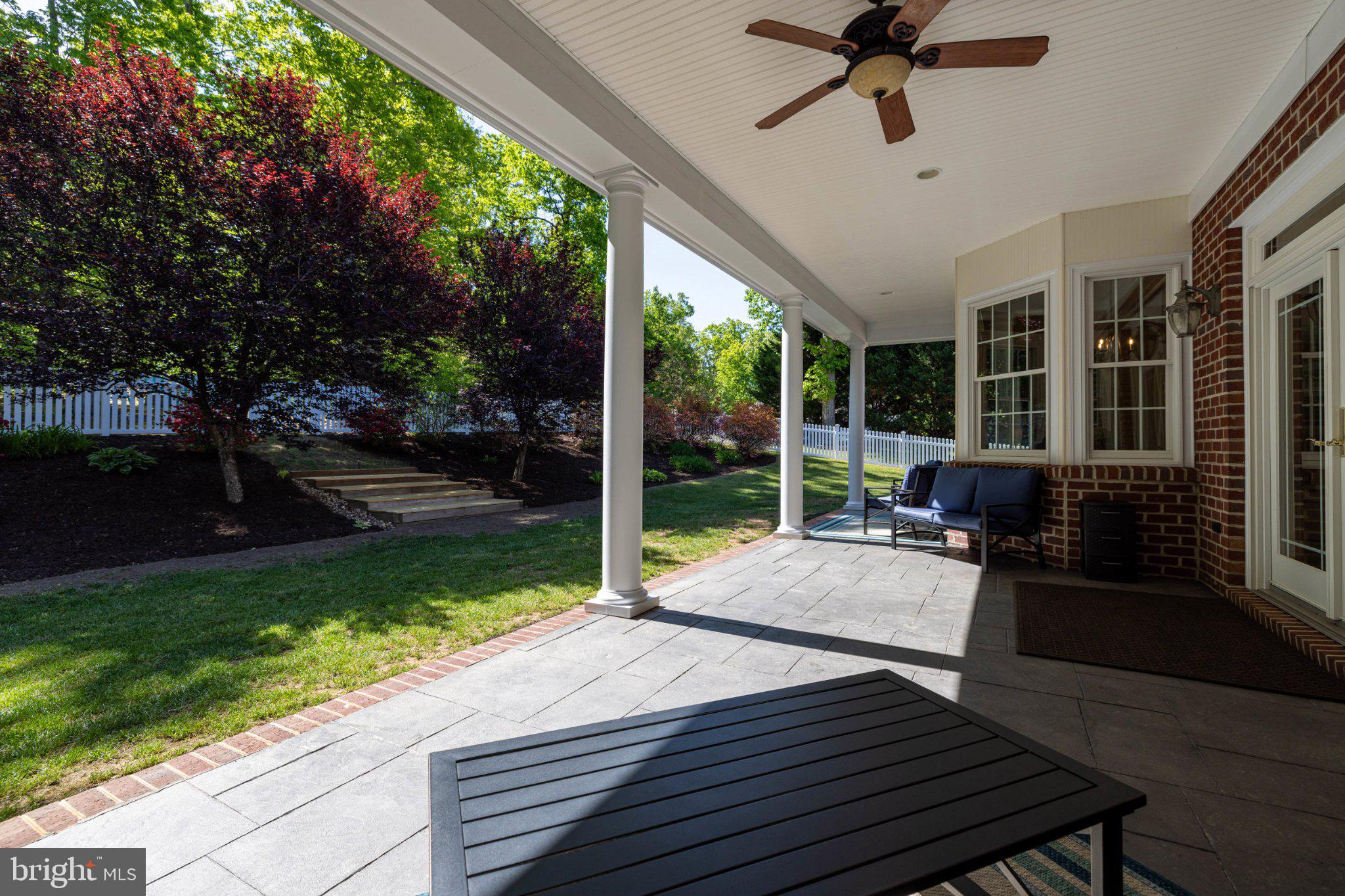 246 Lawsons Farm Circle Ruckersville, VA 22968 - Photo 106 of 130 Serene patio with lush greenery.