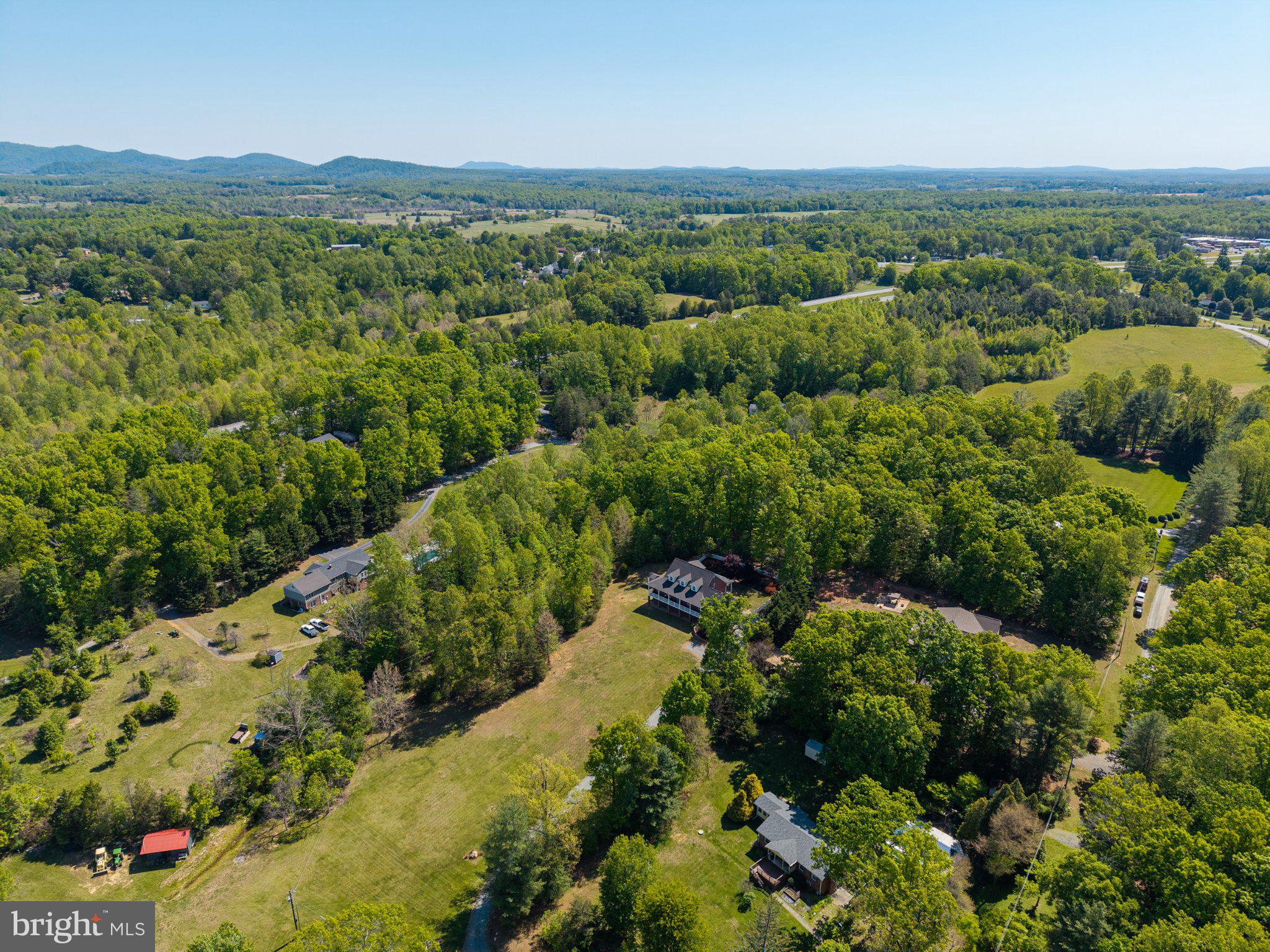 246 Lawsons Farm Circle Ruckersville, VA 22968 - Photo 123 of 130 a view of a lush green field with lots of bushes