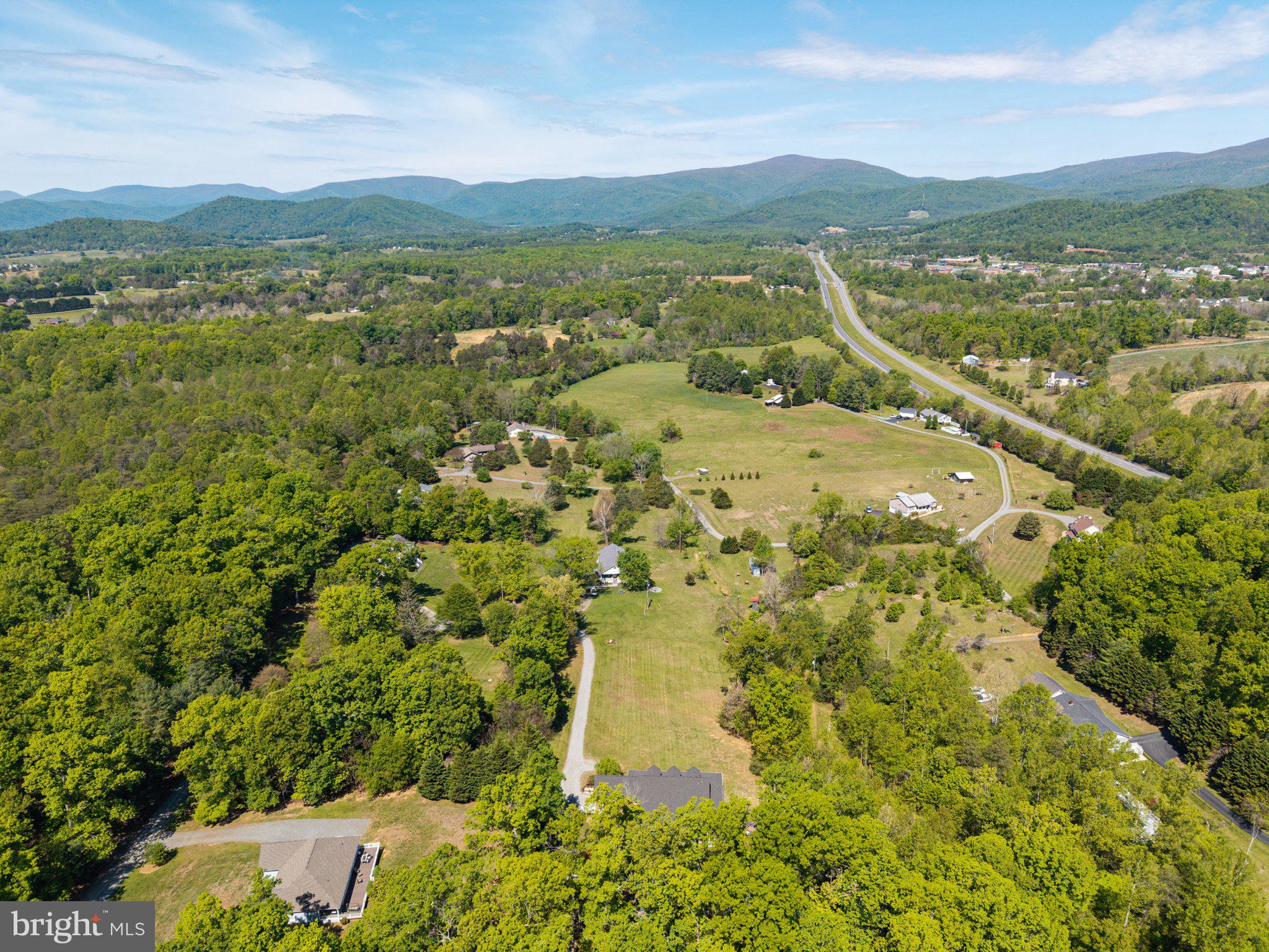 246 Lawsons Farm Circle Ruckersville, VA 22968 - Photo 127 of 130 a view of a city with mountains in the background