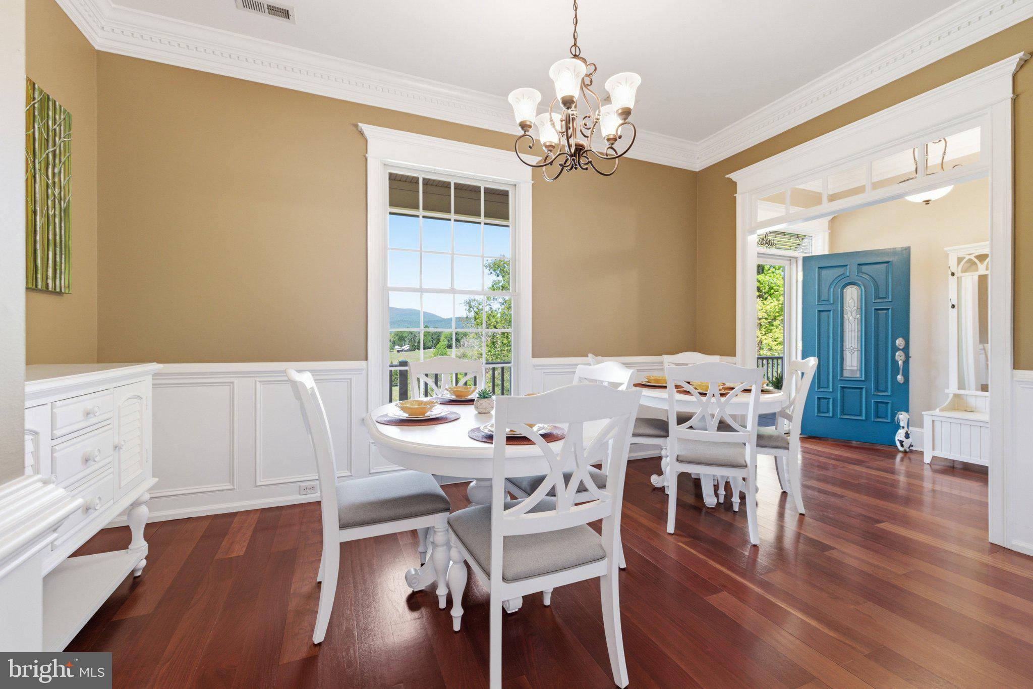246 Lawsons Farm Circle Ruckersville, VA 22968 - Photo 20 of 130 a view of a dining room with furniture and wooden floor