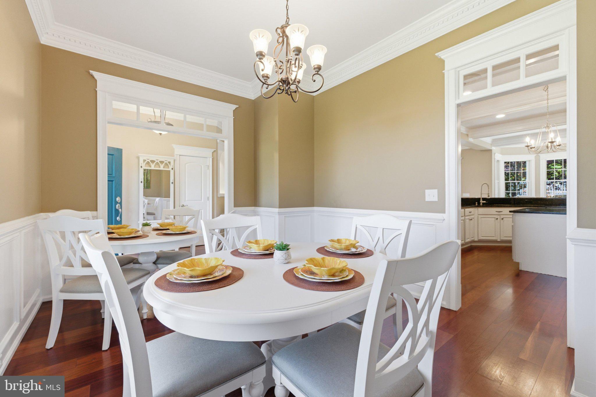 246 Lawsons Farm Circle Ruckersville, VA 22968 - Photo 22 of 130 a view of a dining room with furniture and wooden floor