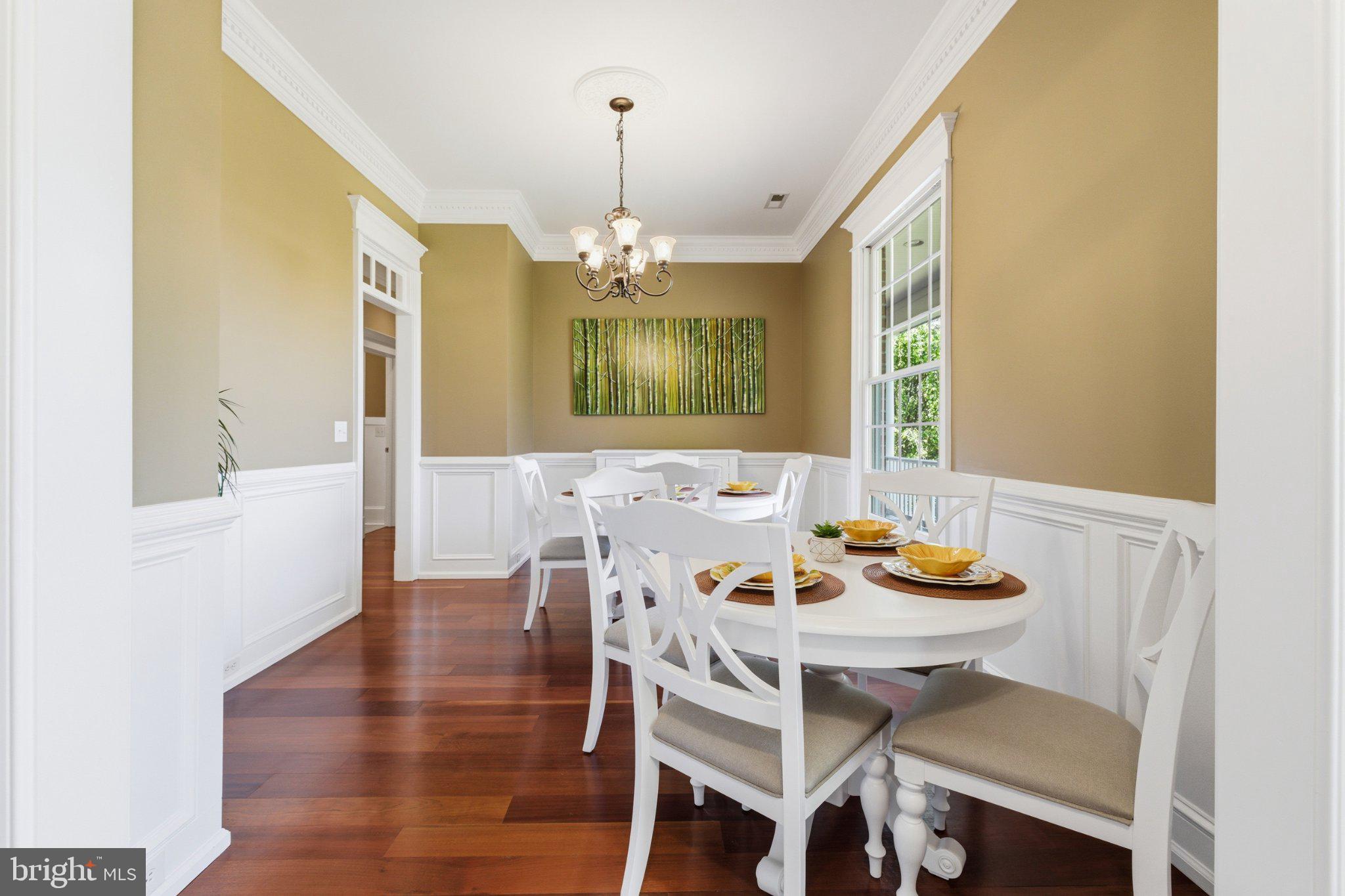 246 Lawsons Farm Circle Ruckersville, VA 22968 - Photo 23 of 130 a view of a dining room with furniture and wooden floor