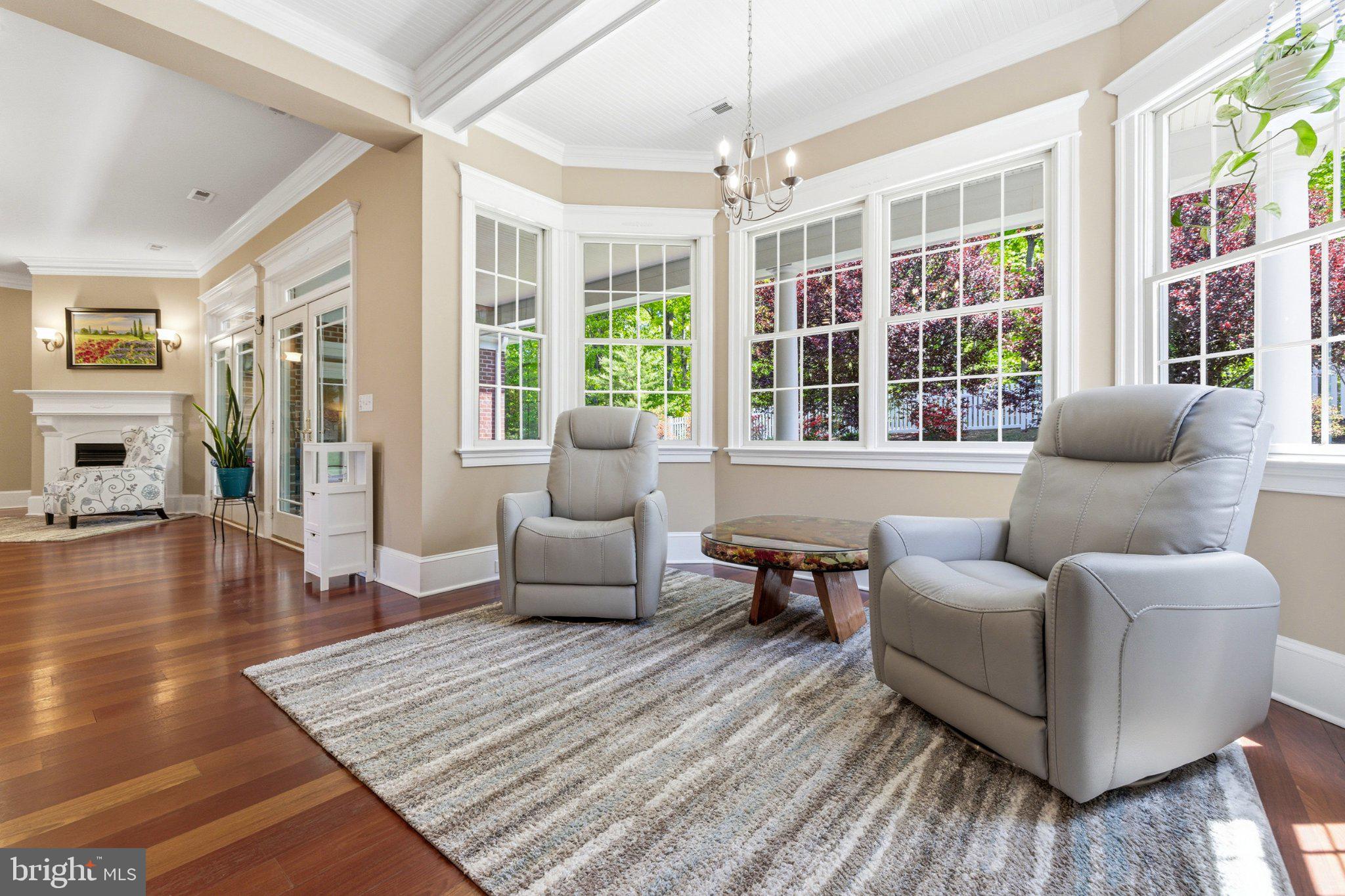 246 Lawsons Farm Circle Ruckersville, VA 22968 - Photo 31 of 130 a living room with furniture and a floor to ceiling window