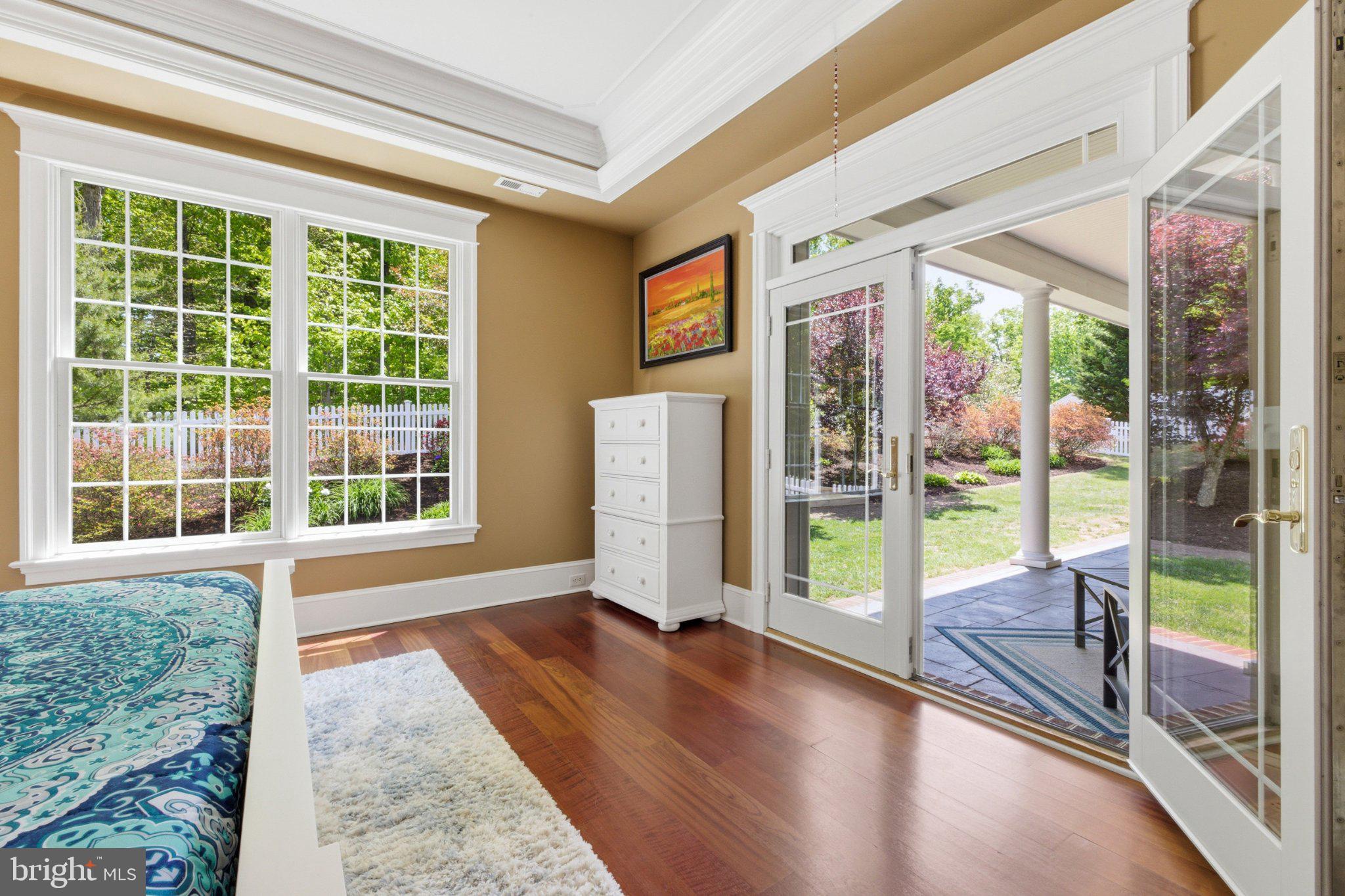 246 Lawsons Farm Circle Ruckersville, VA 22968 - Photo 36 of 130 a view of an entryway with wooden floor and garden