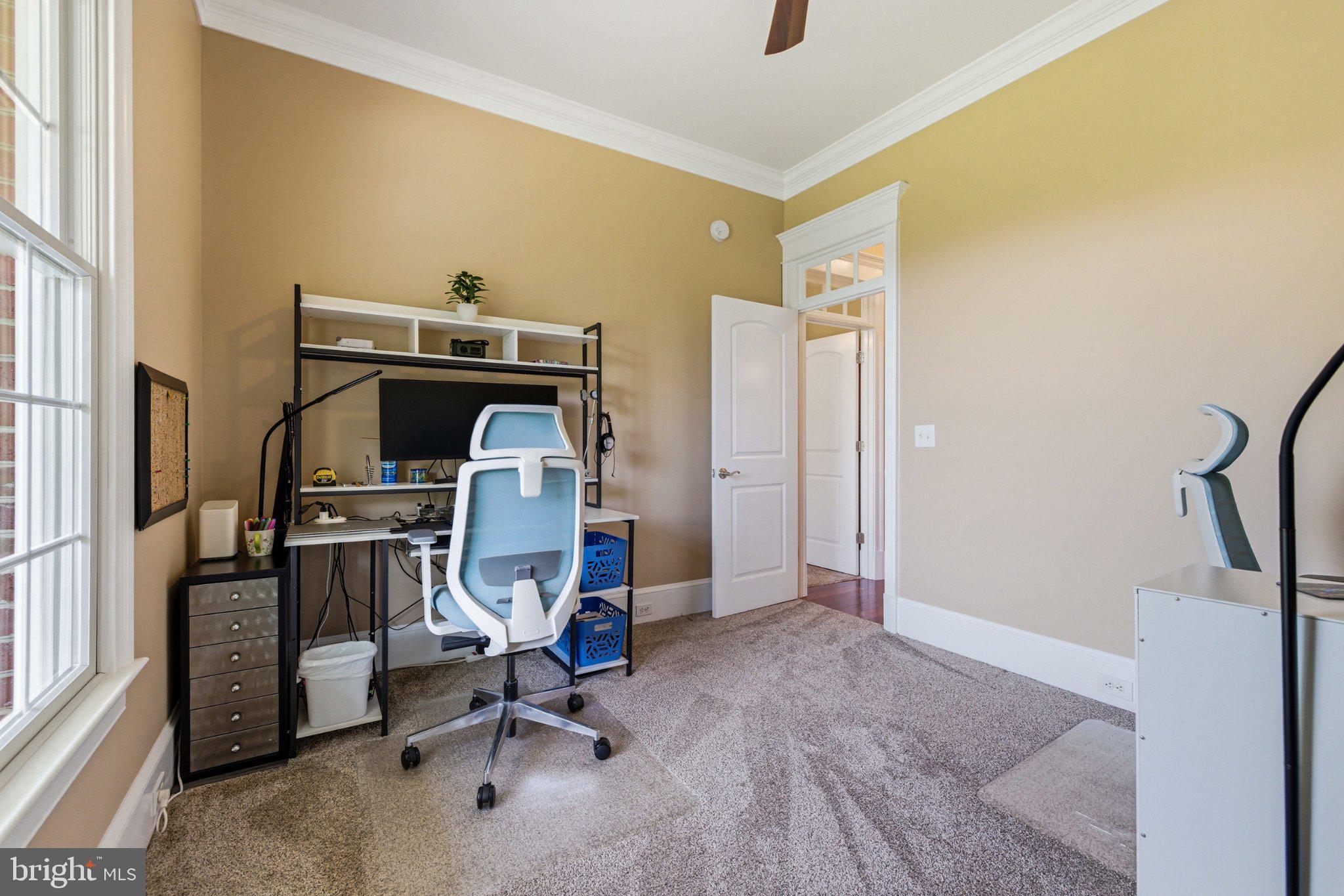 246 Lawsons Farm Circle Ruckersville, VA 22968 - Photo 49 of 130 a view of a workspace with furniture and a window