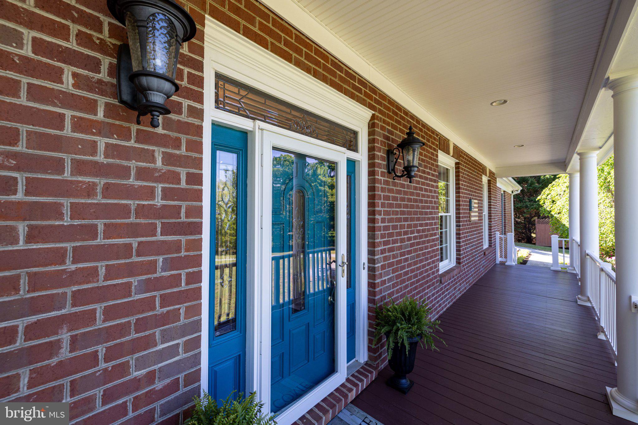 246 Lawsons Farm Circle Ruckersville, VA 22968 - Photo 74 of 130 Charming entryway with vibrant blue door.