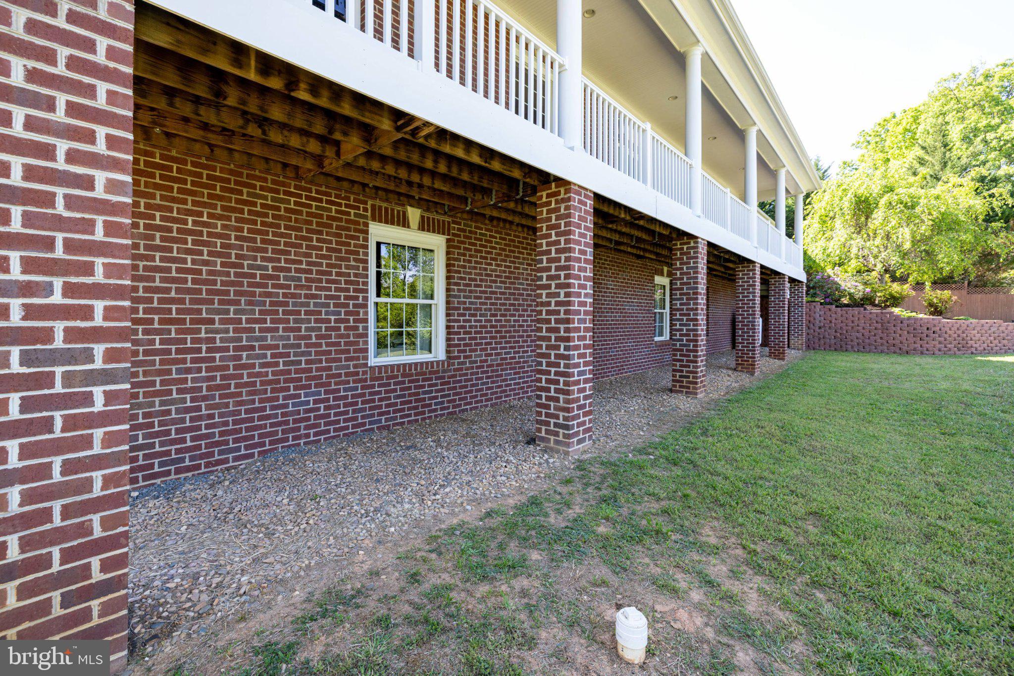 246 Lawsons Farm Circle Ruckersville, VA 22968 - Photo 89 of 130 Charming brick foundation with greenery.