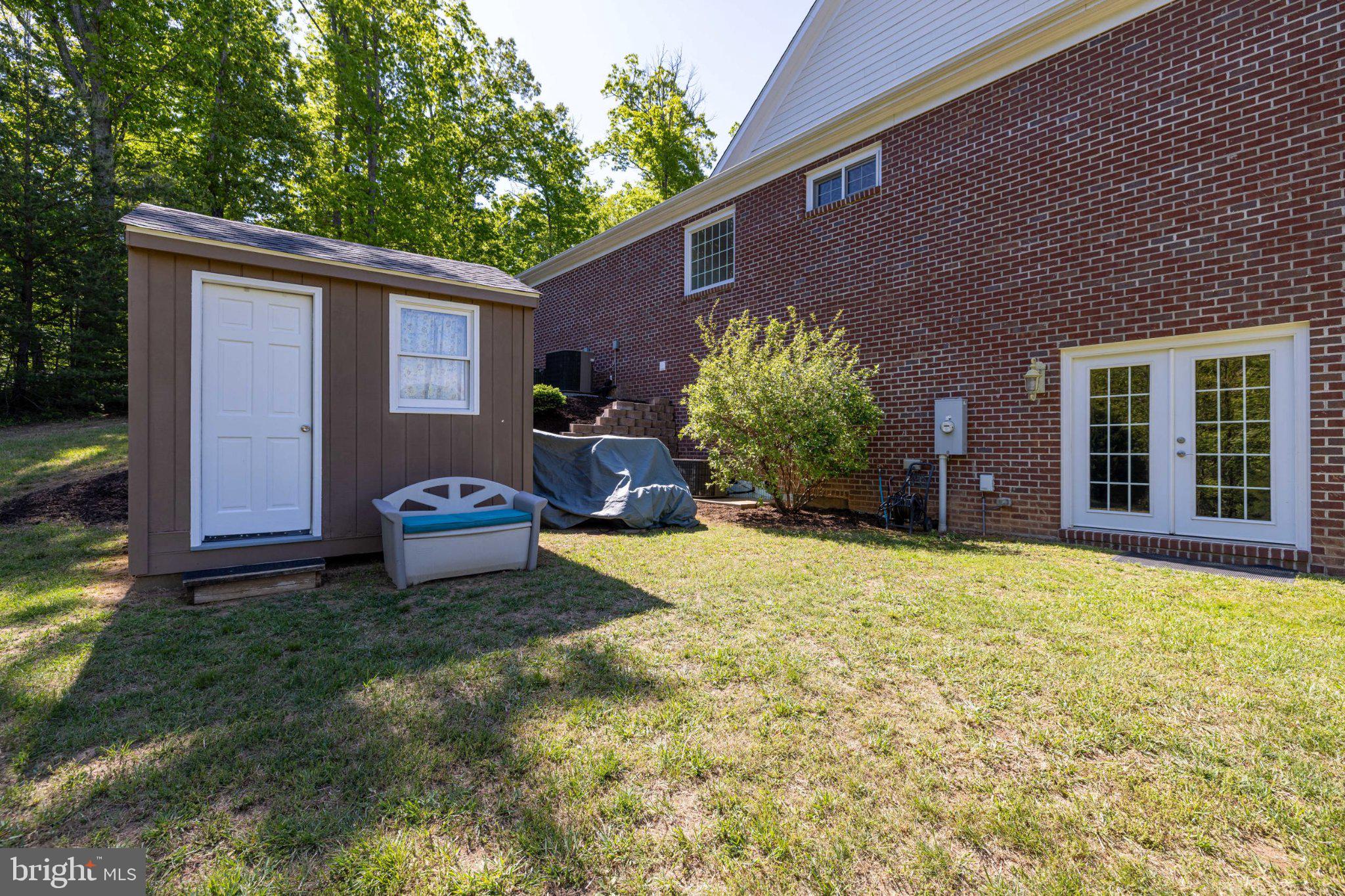246 Lawsons Farm Circle Ruckersville, VA 22968 - Photo 91 of 130 Charming backyard with storage shed.