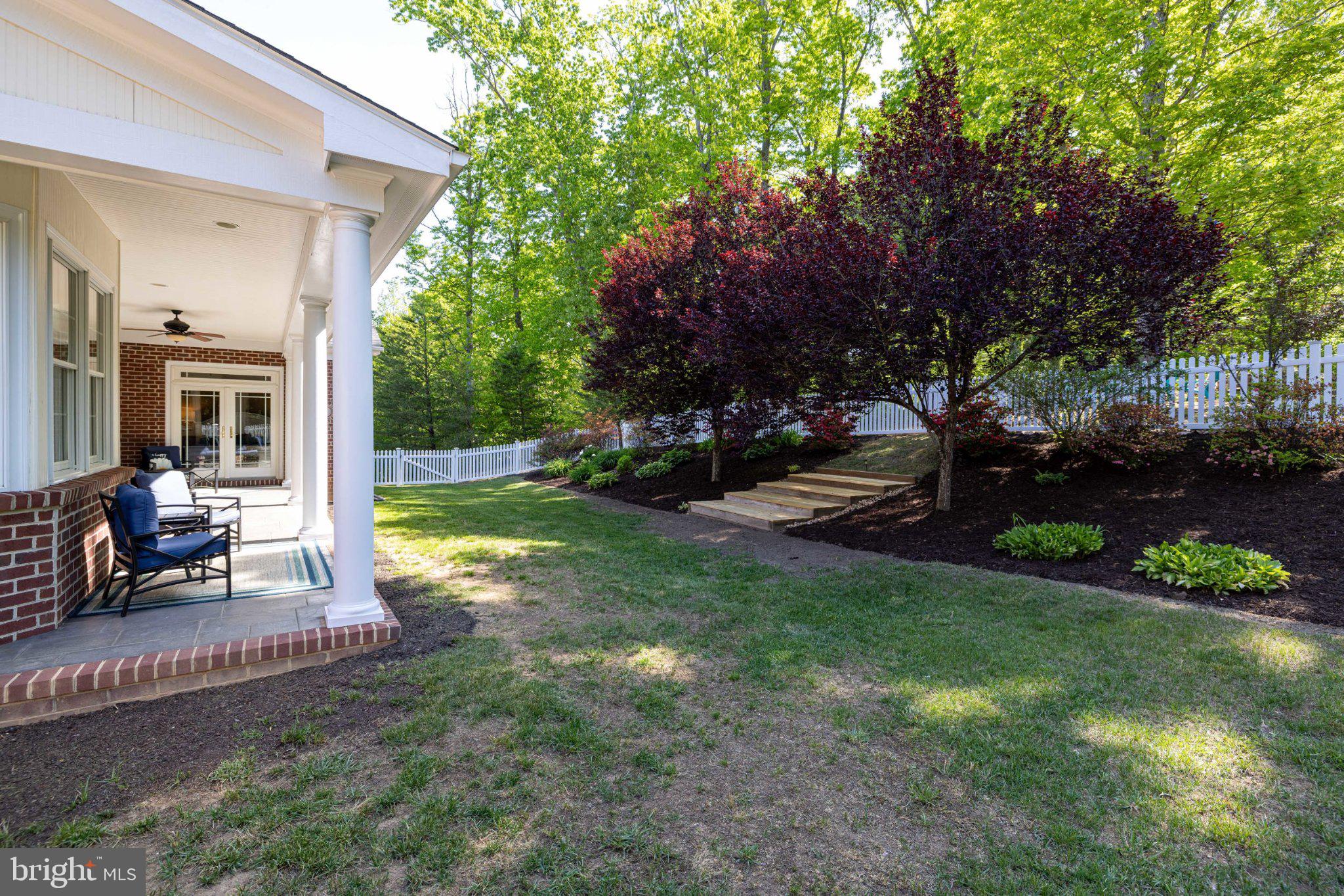 246 Lawsons Farm Circle Ruckersville, VA 22968 - Photo 95 of 130 a view of a house with backyard and sitting area