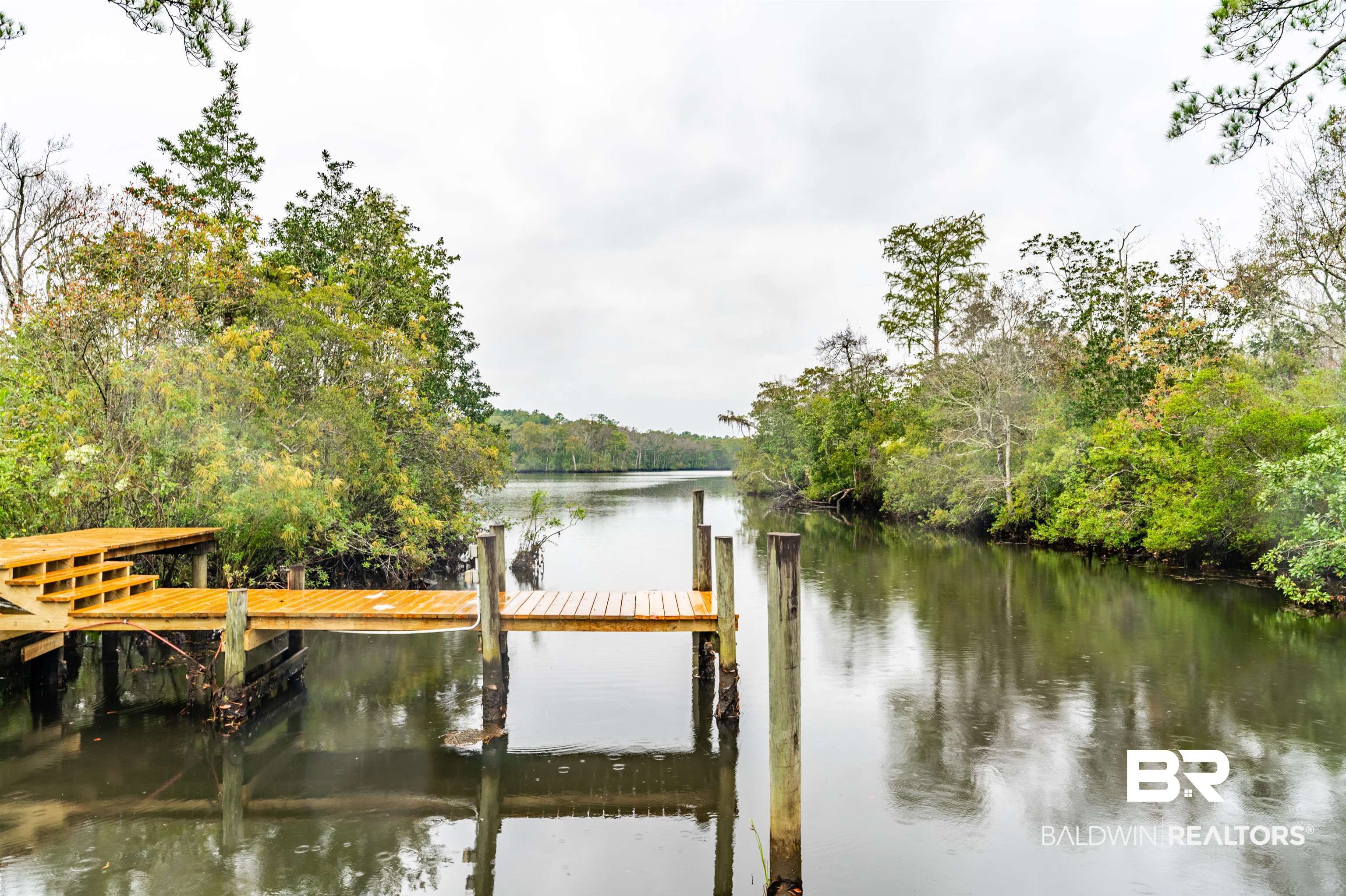 4055 Riviere Du Chien Road Mobile, AL 36693 - Photo 56 of 63 Dock area featuring a water view