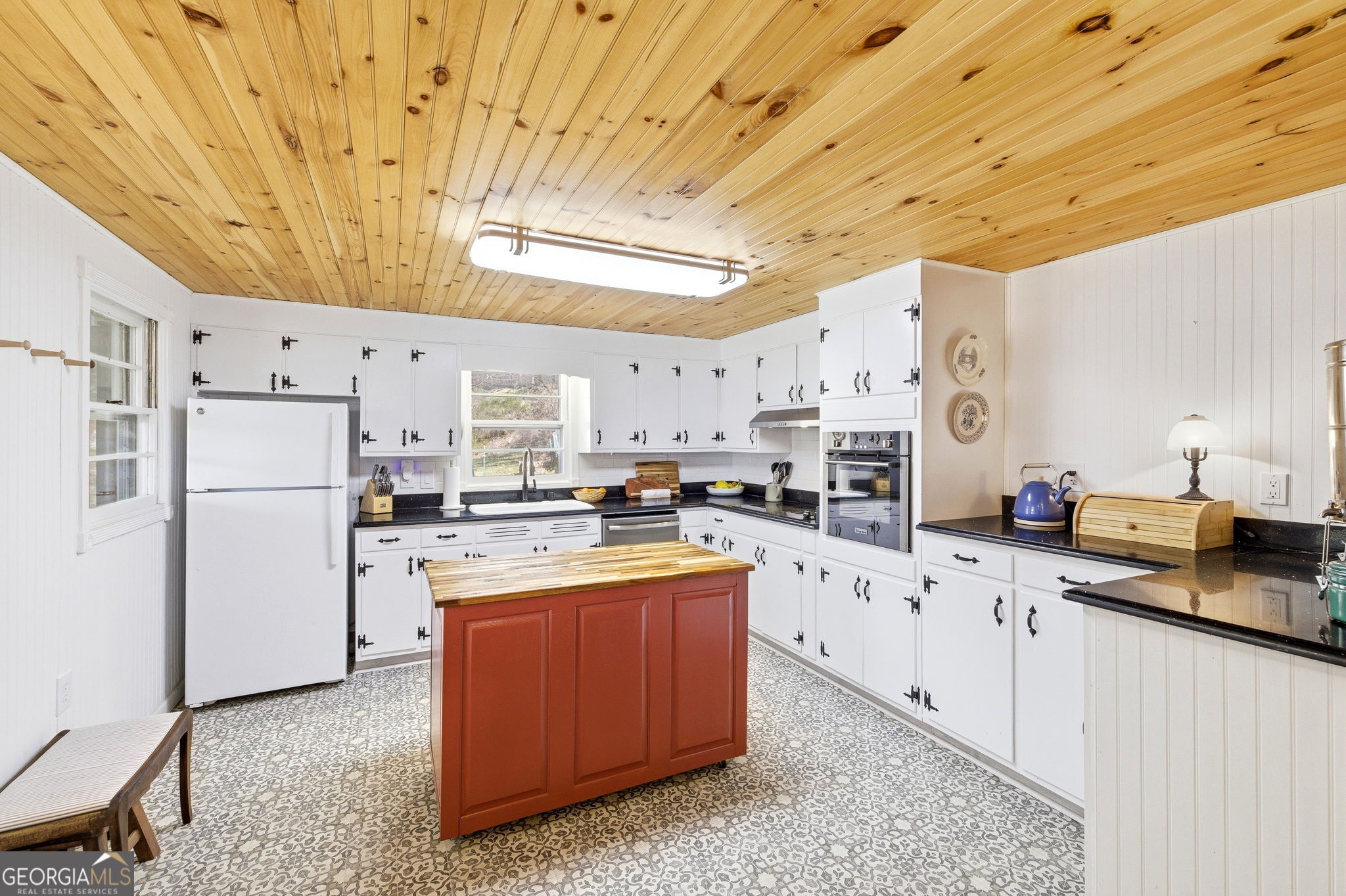 1879 Falls Road Toccoa, GA 30577 - Photo 12 of 36 a kitchen with cabinets appliances and a counter space