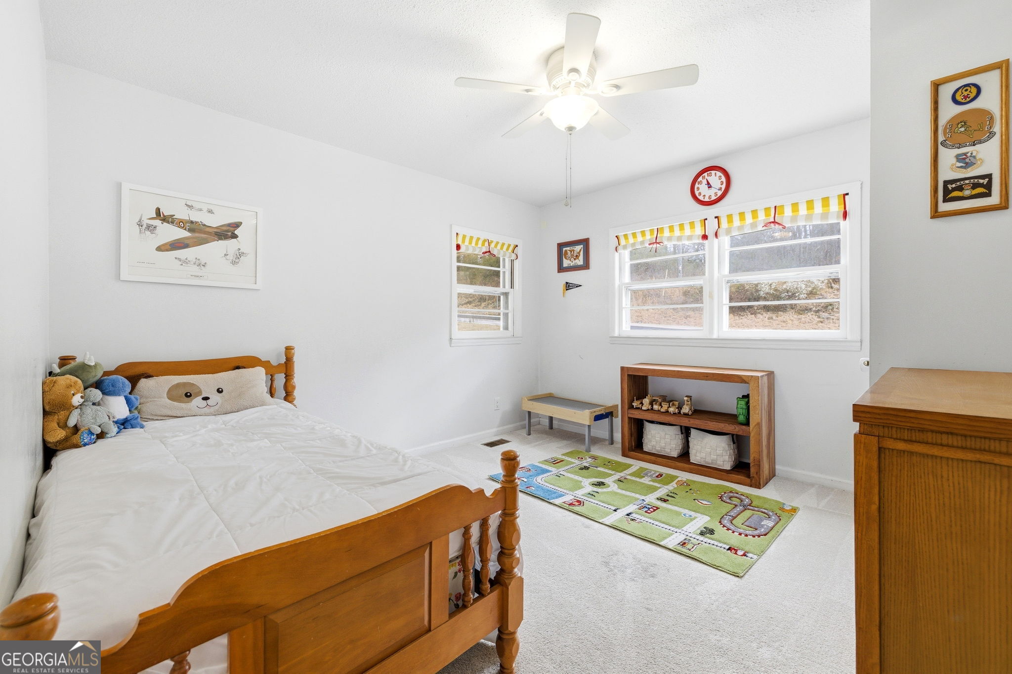1879 Falls Road Toccoa, GA 30577 - Photo 16 of 36 a bedroom with a bed and a window