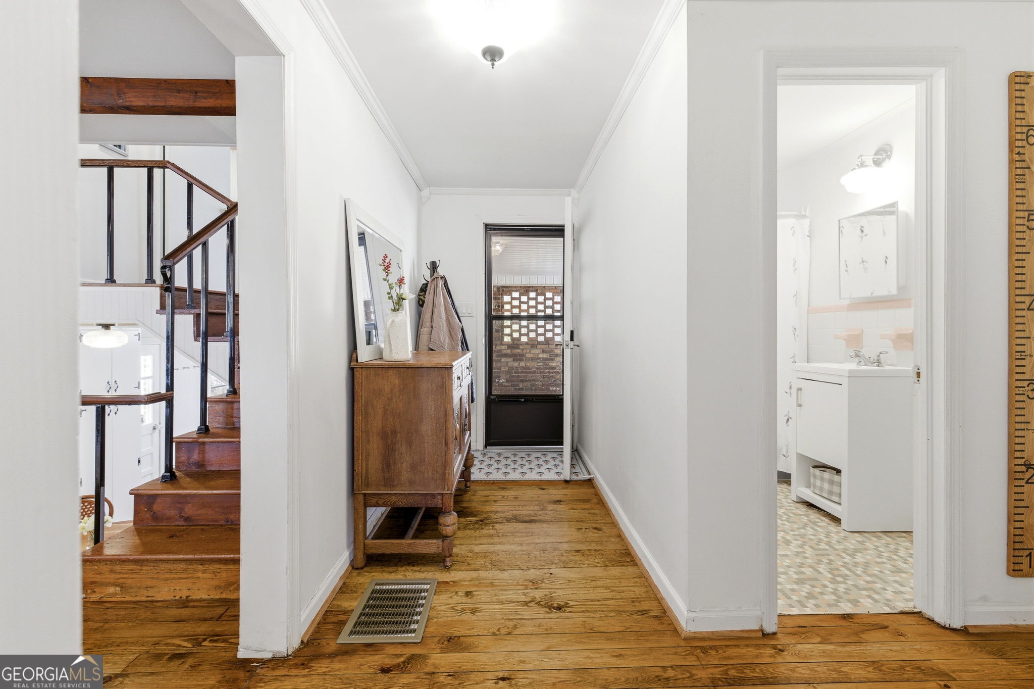 1879 Falls Road Toccoa, GA 30577 - Photo 21 of 36 a view of a hallway with wooden floor and entryway