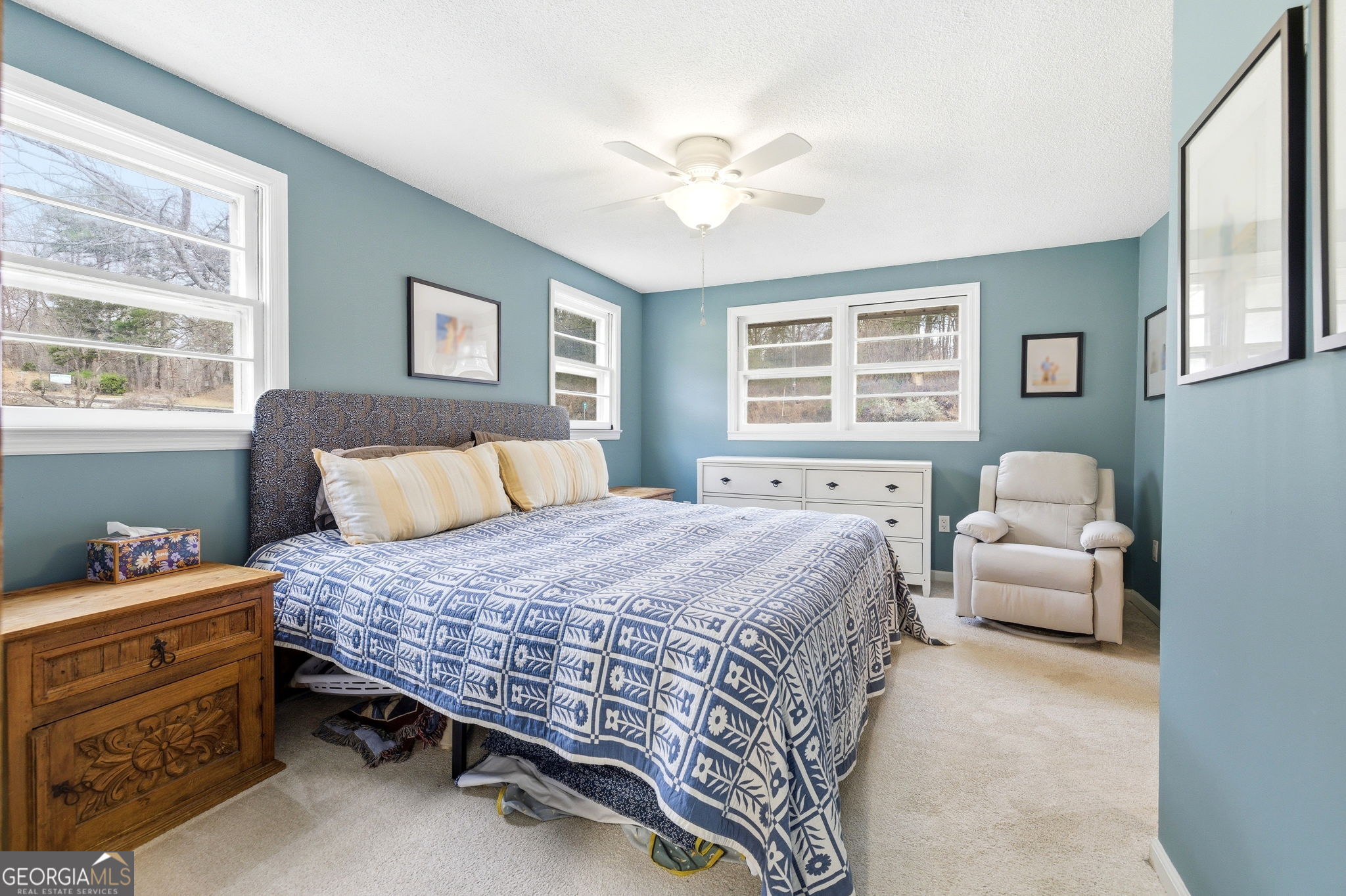 1879 Falls Road Toccoa, GA 30577 - Photo 23 of 36 a bedroom with a bed and a couch