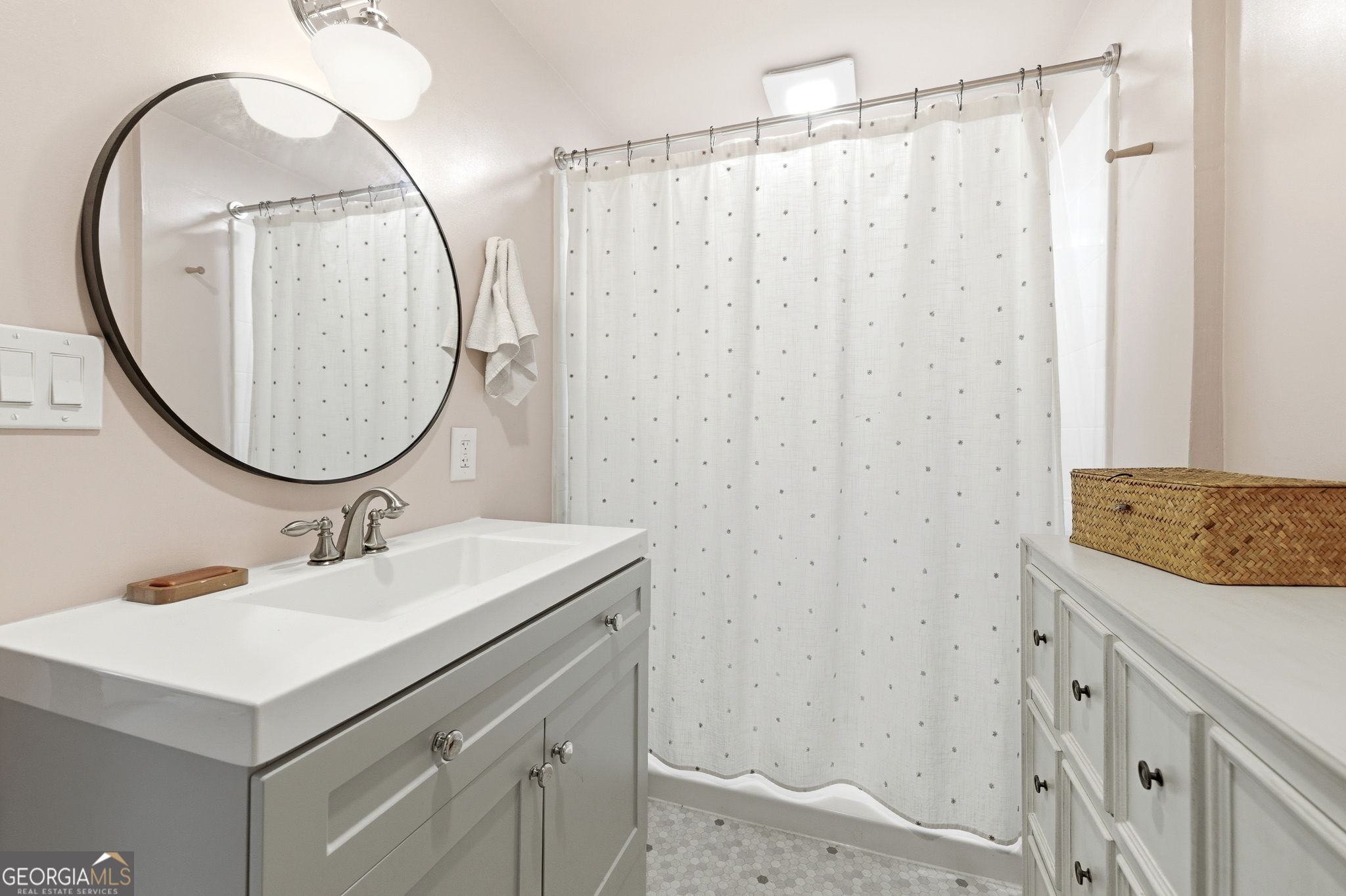 1879 Falls Road Toccoa, GA 30577 - Photo 28 of 36 a bathroom with a sink and a mirror