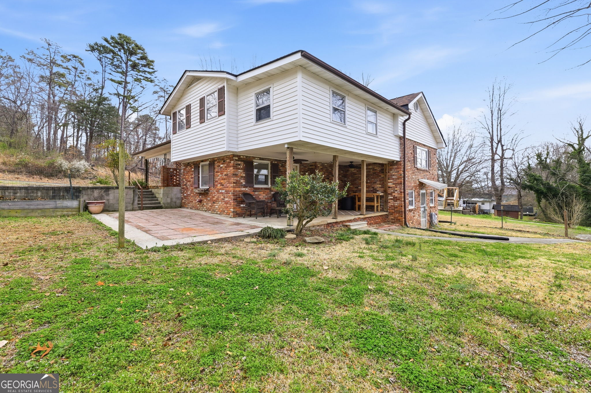1879 Falls Road Toccoa, GA 30577 - Photo 31 of 36 a front view of a house with garden