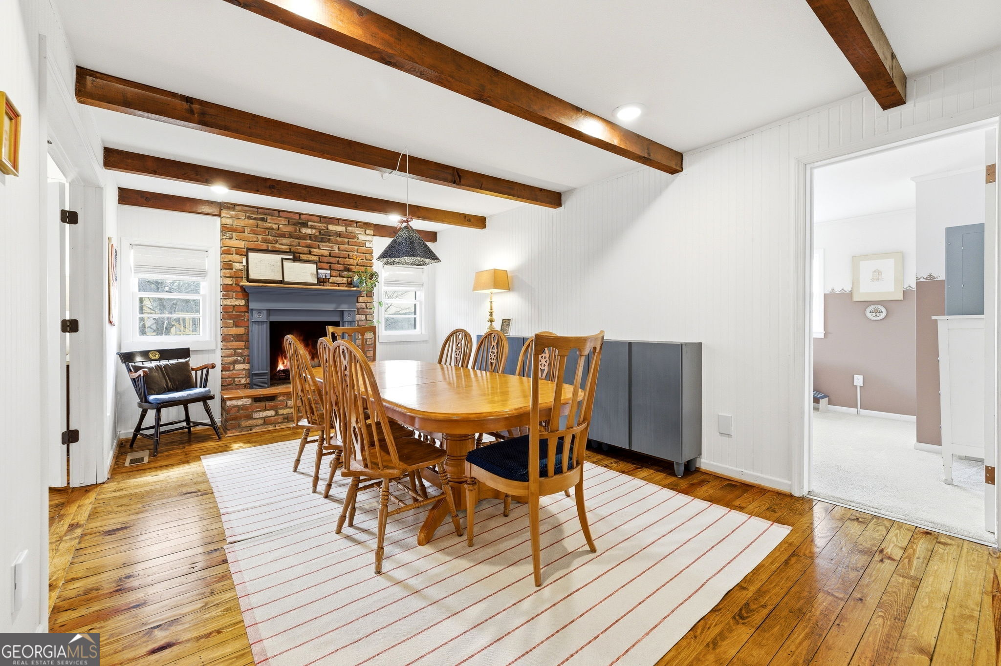 1879 Falls Road Toccoa, GA 30577 - Photo 9 of 36 a dining room with furniture and wooden floor