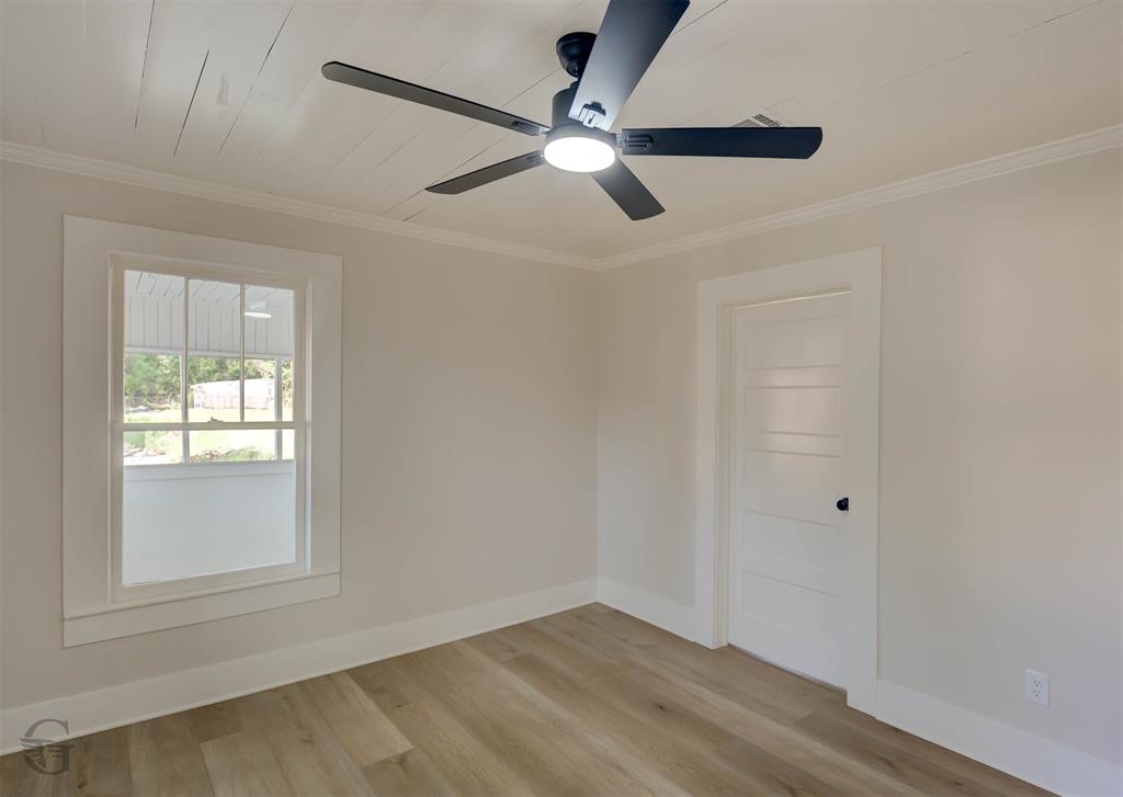 510 Constable Street Minden, LA 71055 - Photo 14 of 18 an empty room with window and ceiling fan