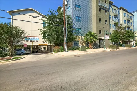 a view of a building with a street