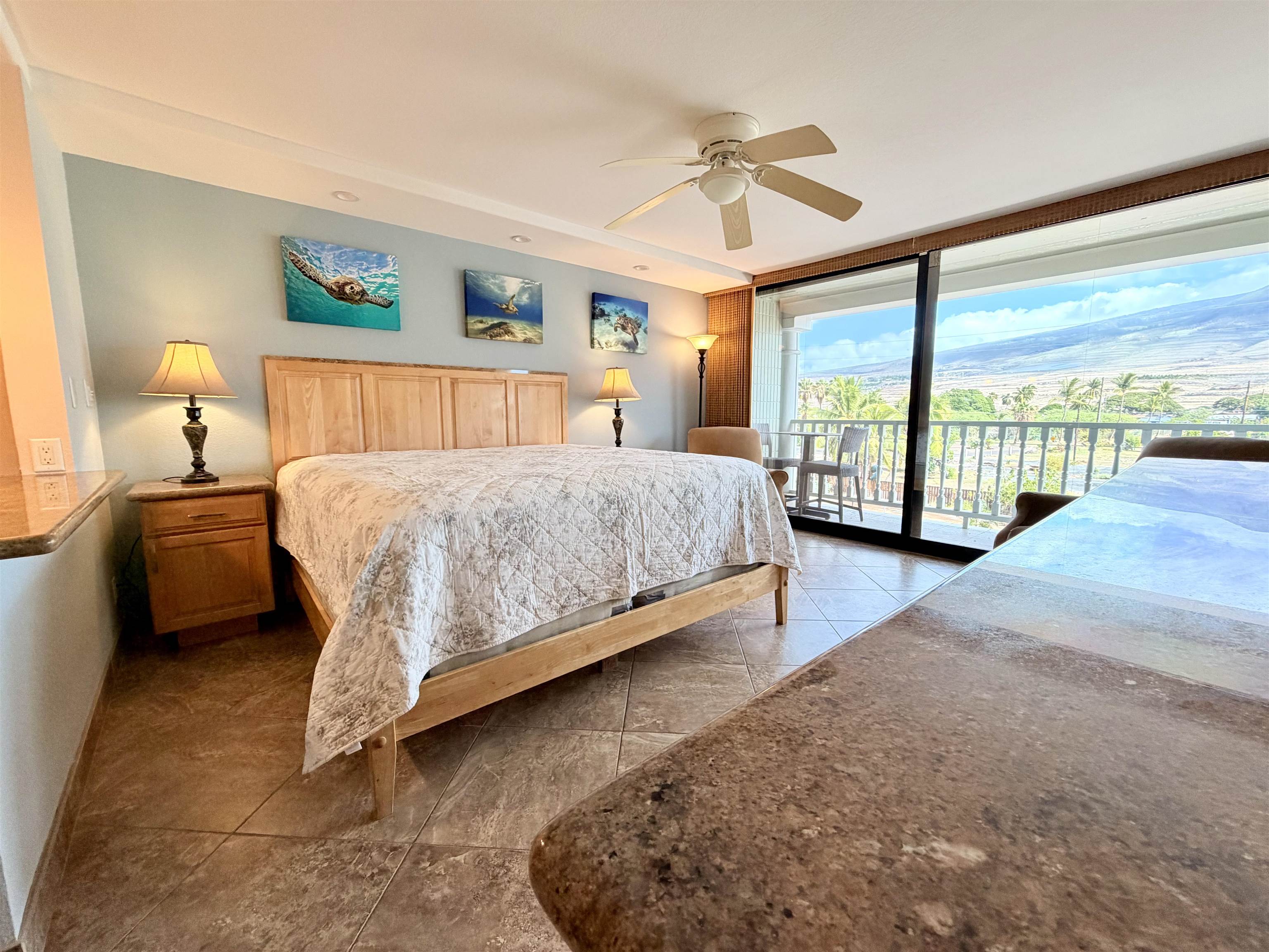 475 Front Street, Unit 320 Lahaina, HI 96761 - Photo 11 of 41 a bedroom with a bed and large windows