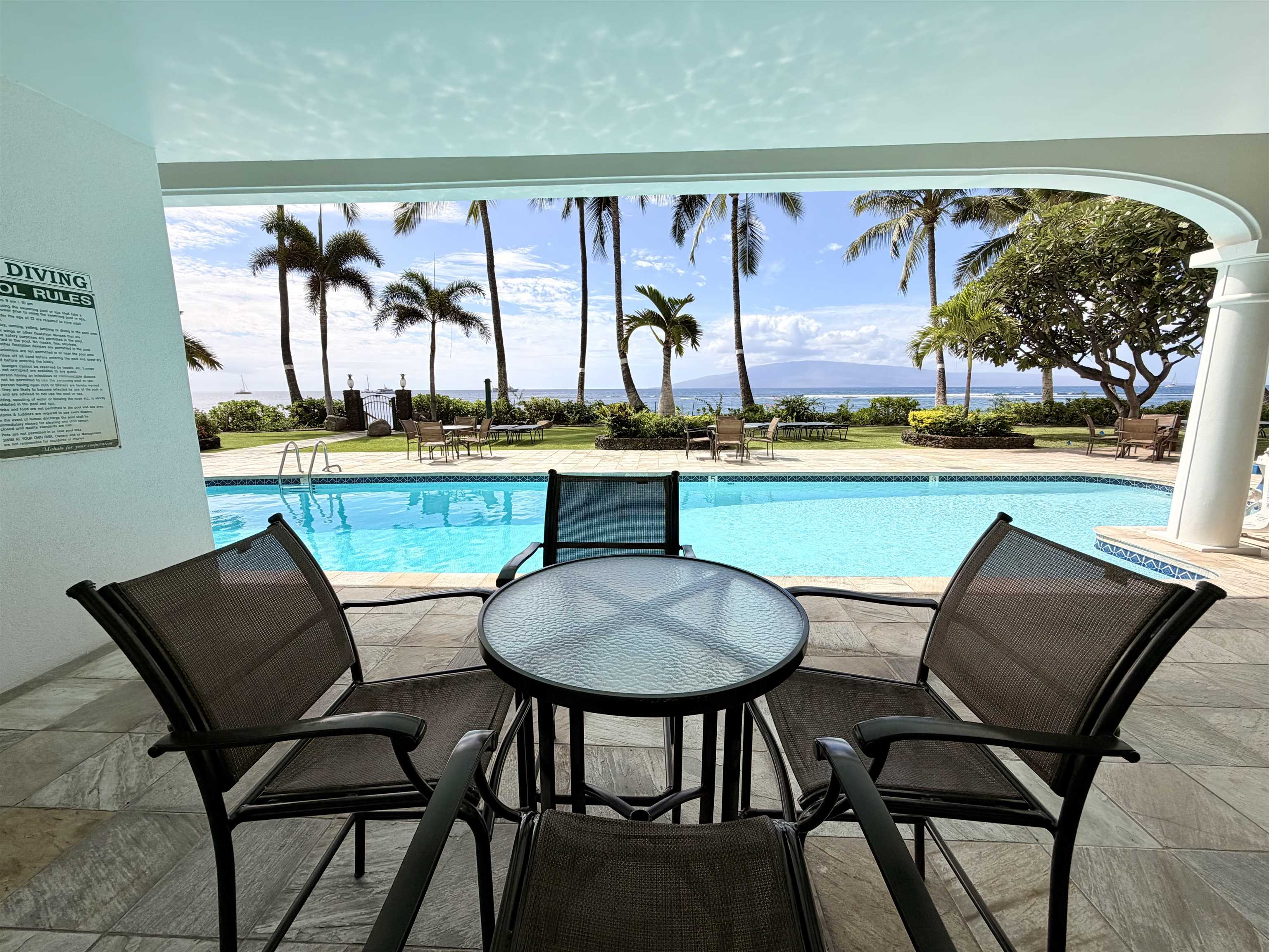475 Front Street, Unit 320 Lahaina, HI 96761 - Photo 28 of 41 a view of a dining room with furniture window and wooden floor