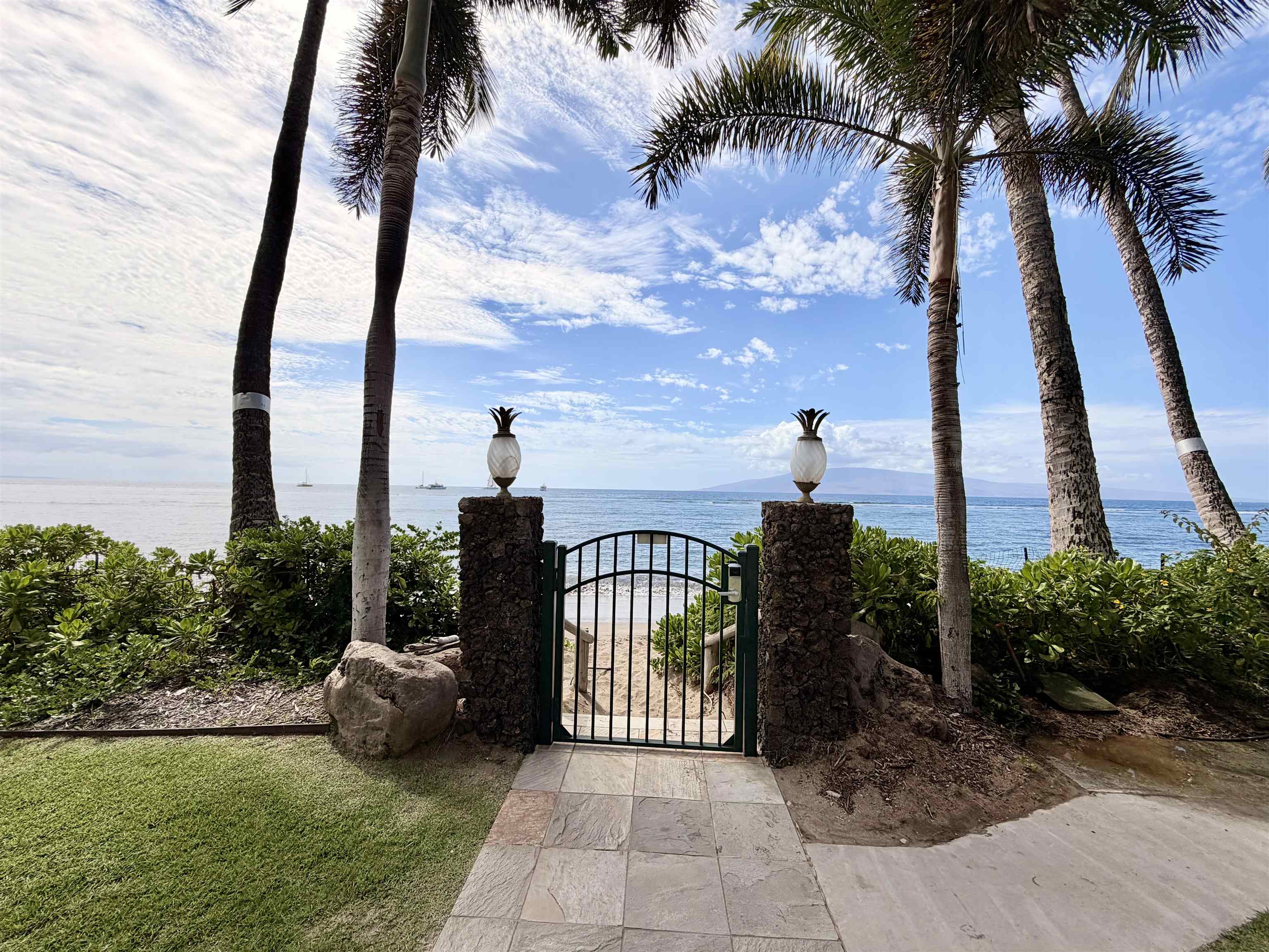 475 Front Street, Unit 320 Lahaina, HI 96761 - Photo 32 of 41 a view of a garden with sitting area