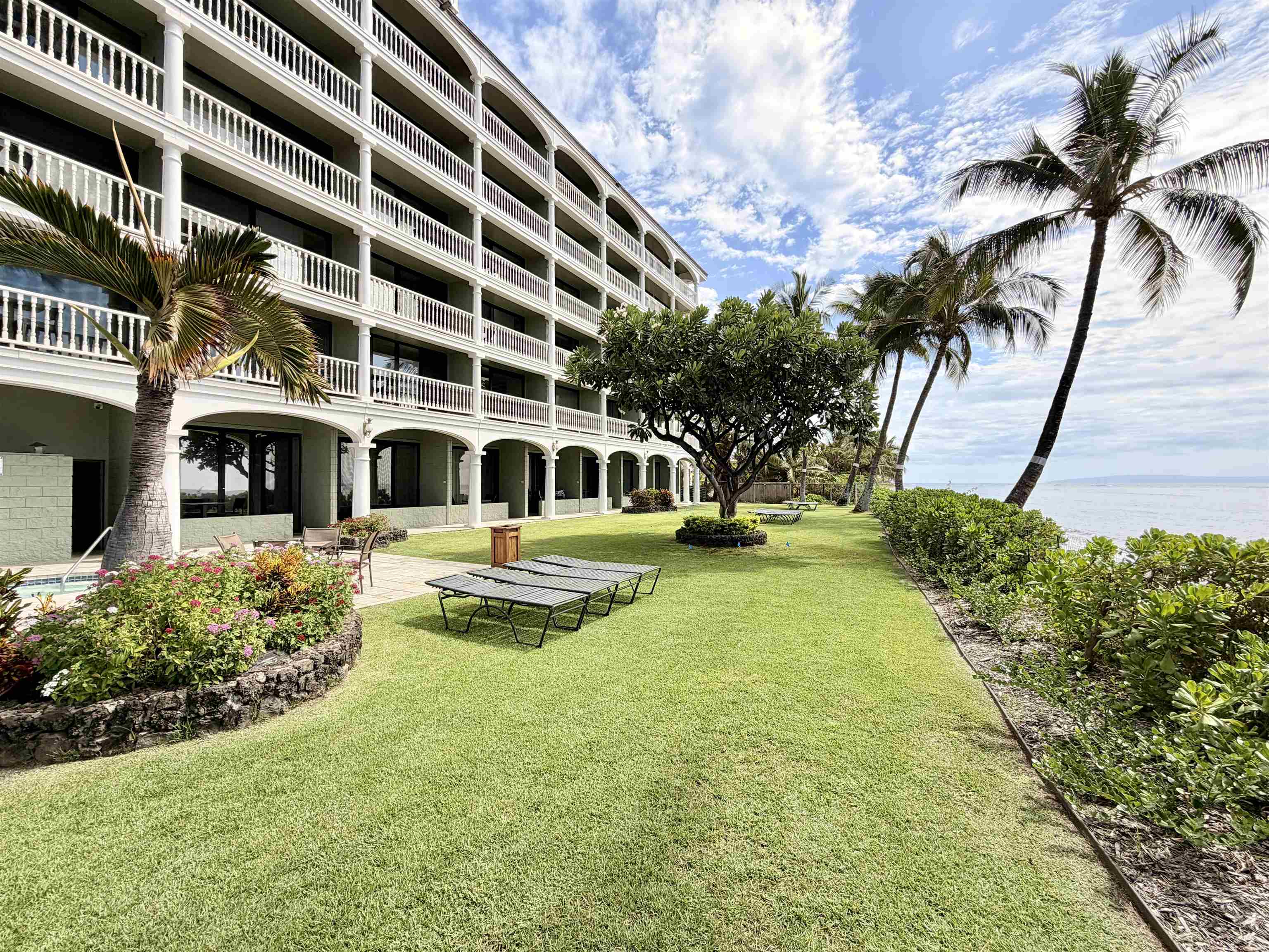 475 Front Street, Unit 320 Lahaina, HI 96761 - Photo 33 of 41 a front view of house with yard and green space
