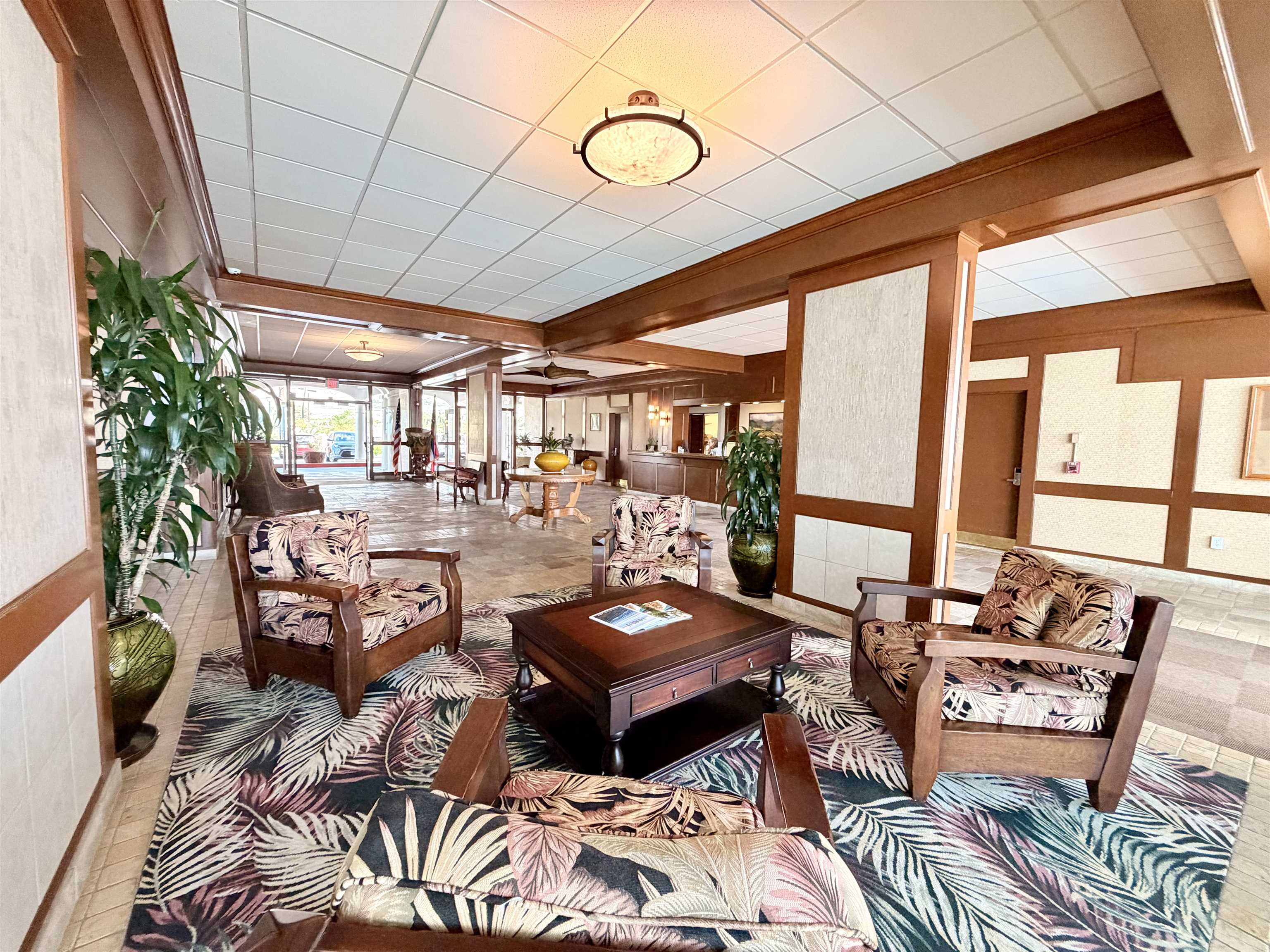 475 Front Street, Unit 320 Lahaina, HI 96761 - Photo 37 of 41 a living room with furniture and floor to ceiling windows