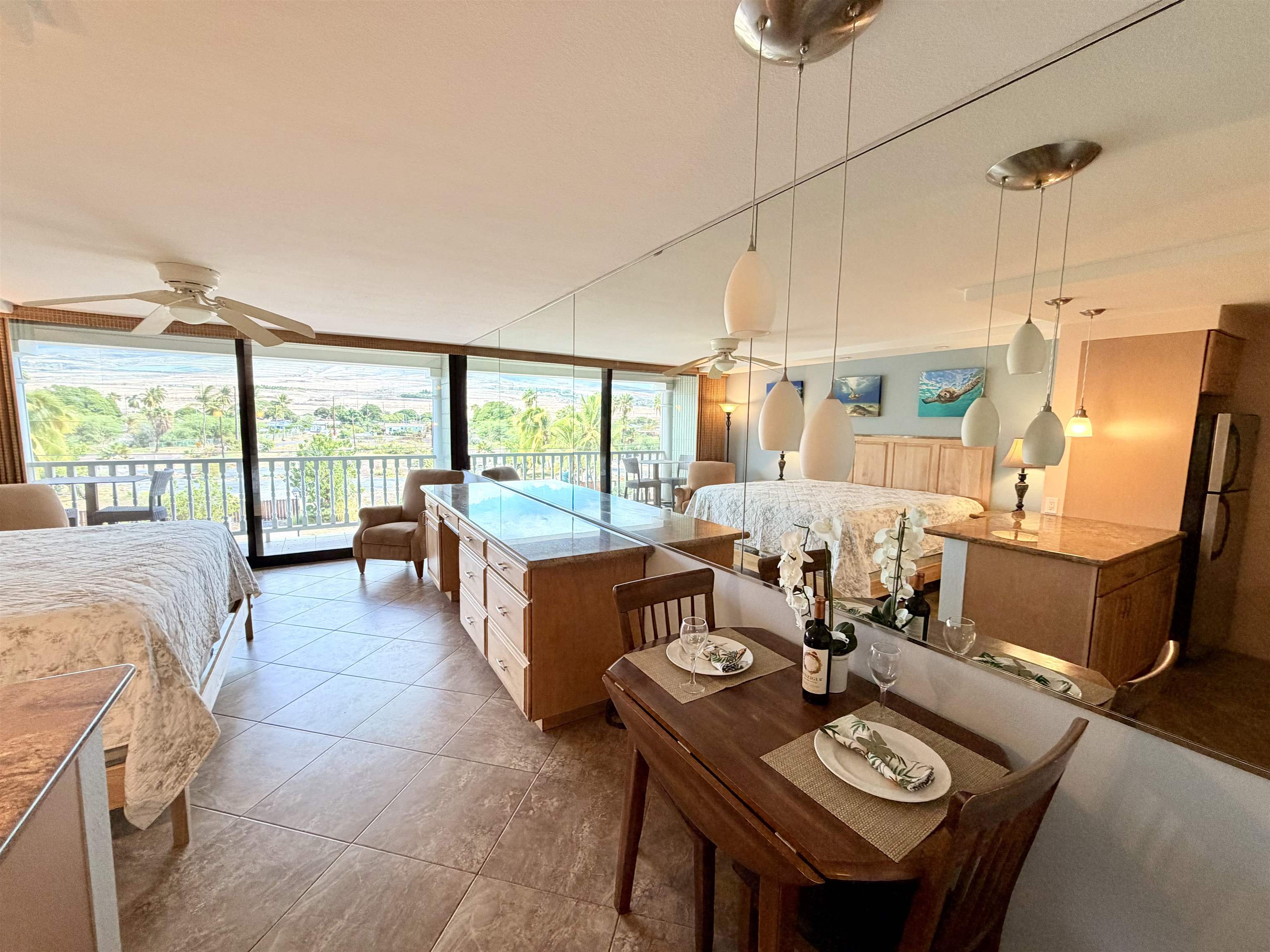 475 Front Street, Unit 320 Lahaina, HI 96761 - Photo 8 of 41 a living room with furniture and a floor to ceiling window