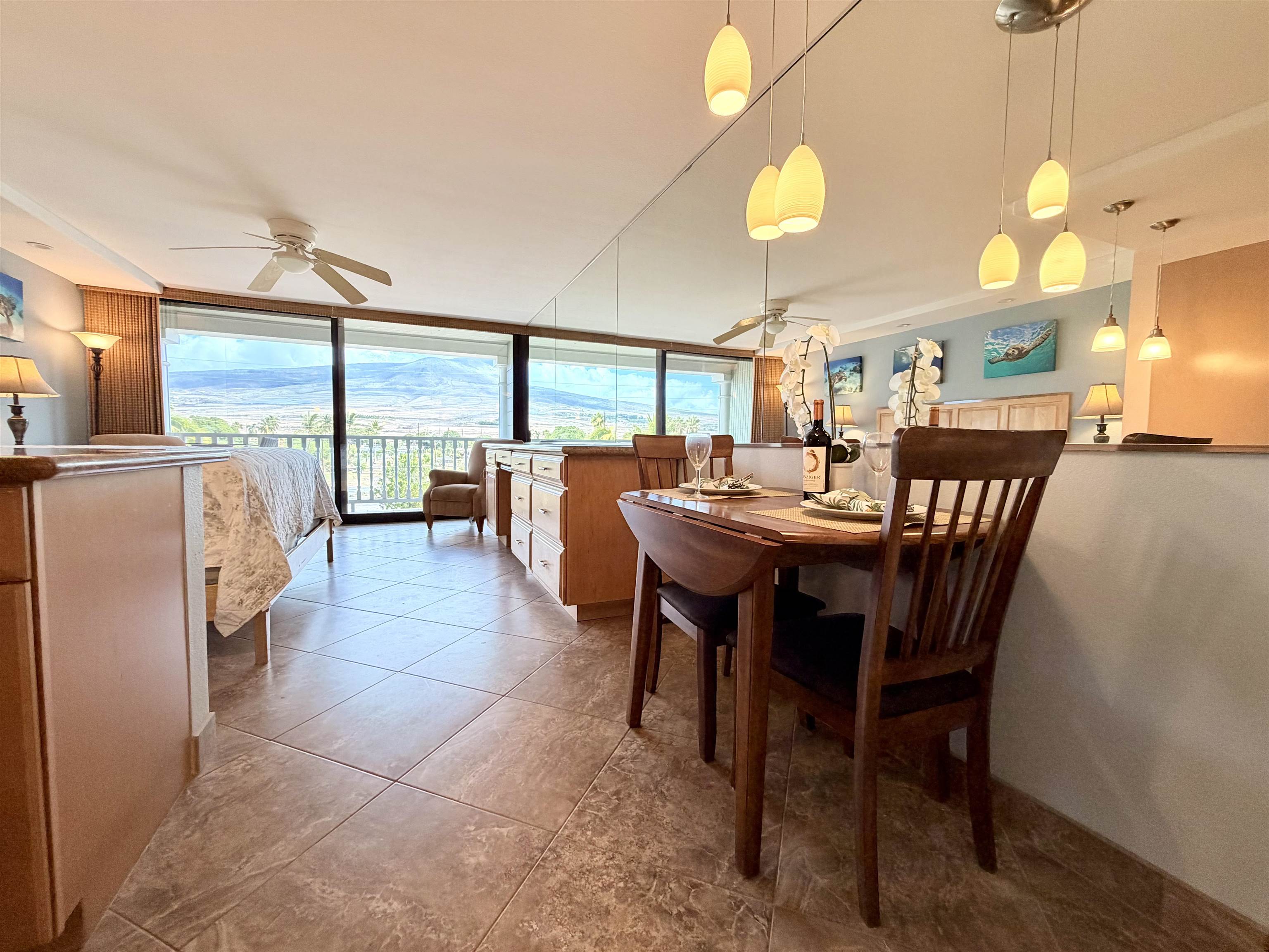 475 Front Street, Unit 320 Lahaina, HI 96761 - Photo 9 of 41 a view of a dining room with furniture window and outside view