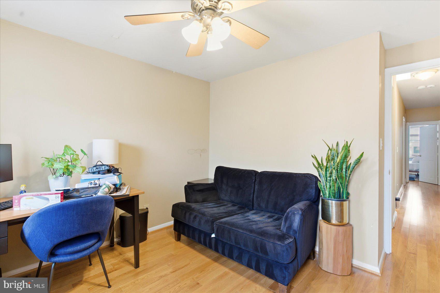 1408 Webster Street Baltimore, MD 21230 - Photo 18 of 30 a living room with furniture flowerpot and a potted plant