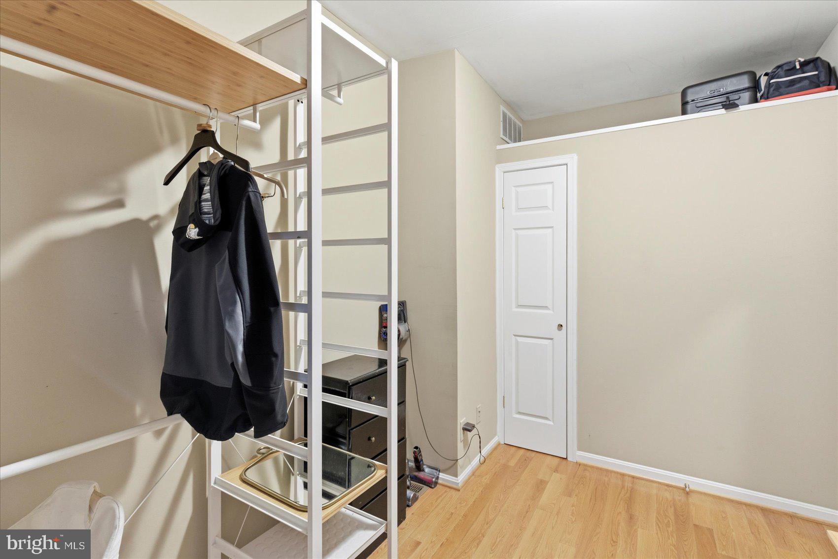 1408 Webster Street Baltimore, MD 21230 - Photo 20 of 30 a view of walk in closet with empty room