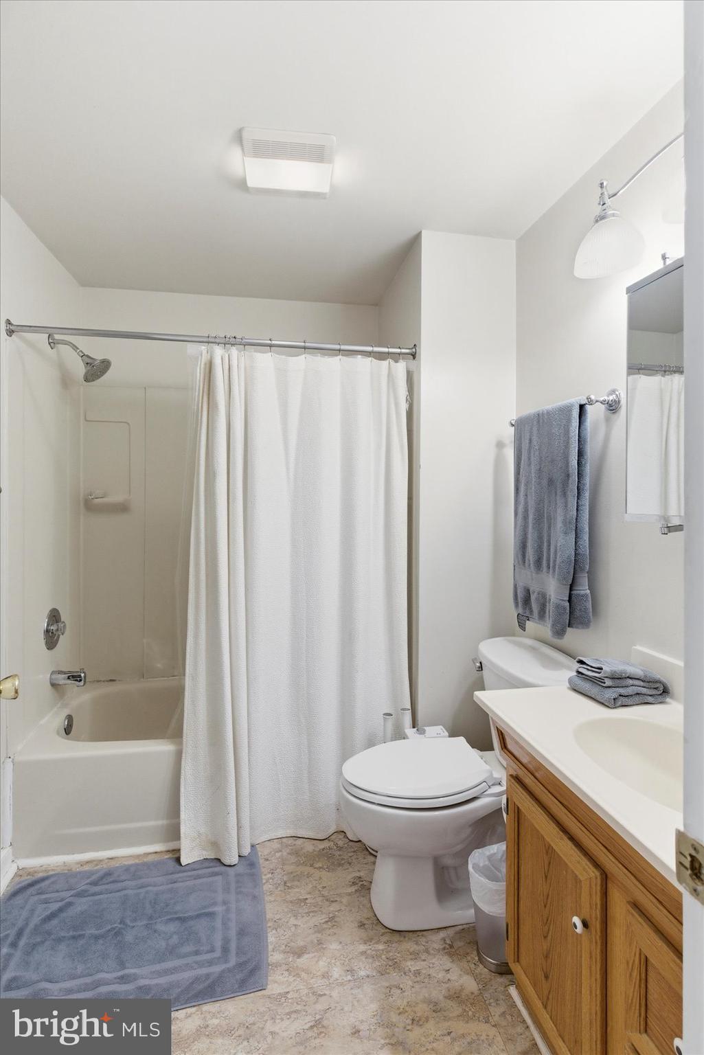 1408 Webster Street Baltimore, MD 21230 - Photo 22 of 30 a bathroom with a sink toilet and shower