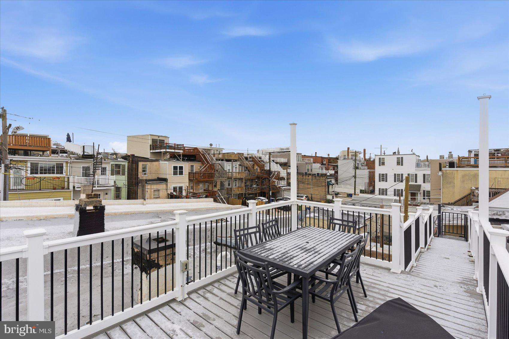 1408 Webster Street Baltimore, MD 21230 - Photo 25 of 30 a view of a balcony with furniture