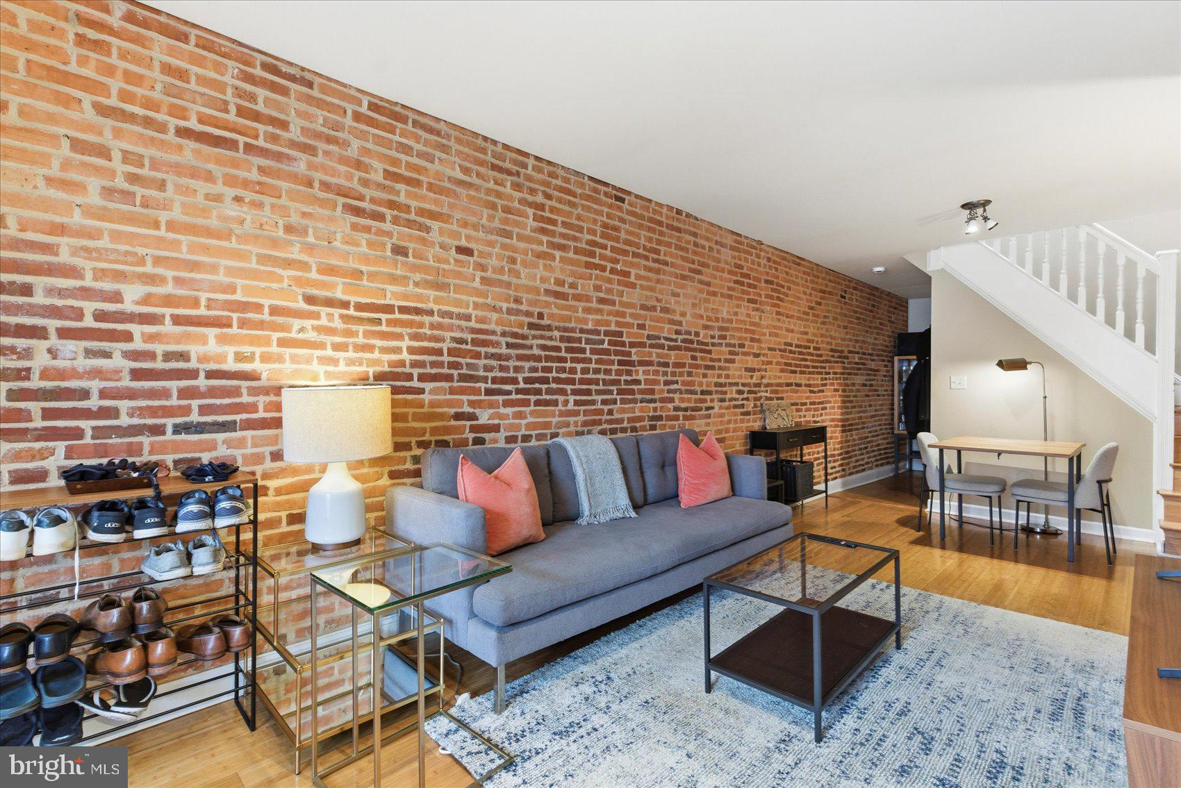1408 Webster Street Baltimore, MD 21230 - Photo 3 of 30 a living room with furniture and a table