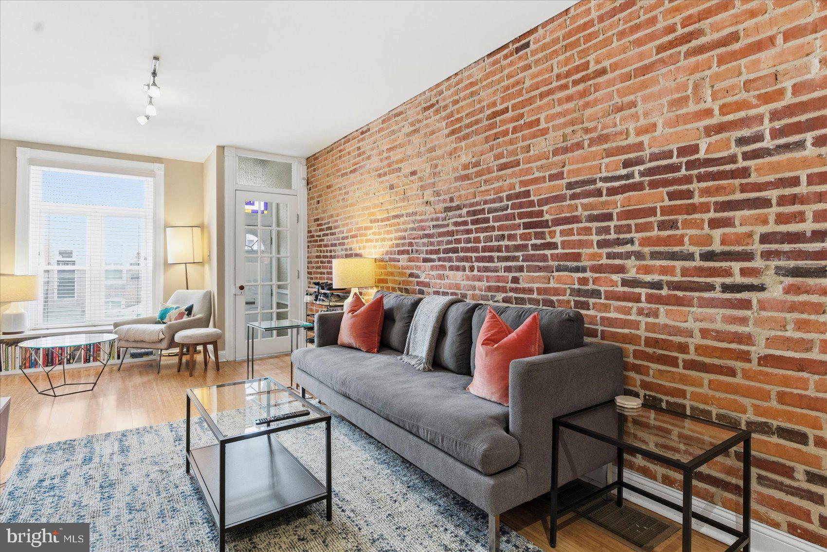 1408 Webster Street Baltimore, MD 21230 - Photo 5 of 30 a living room with furniture and a rug