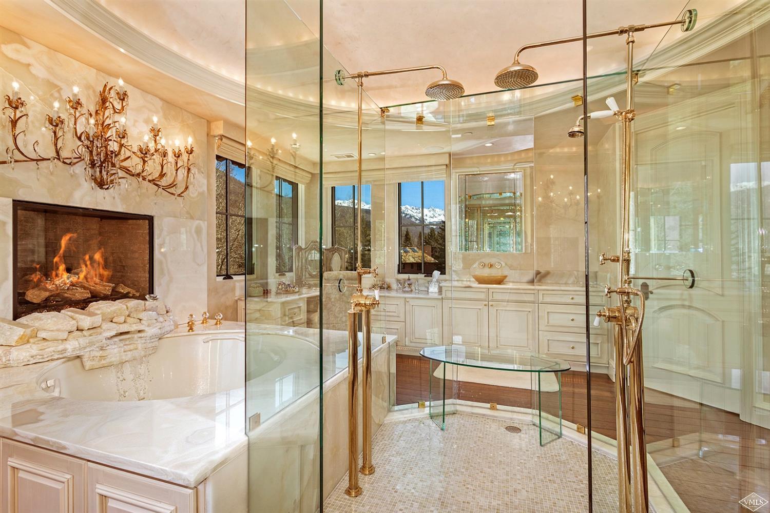 1109 Vail Valley Drive Vail, CO 81657 - Photo 12 of 25 a view of a bathroom with a tub and shower