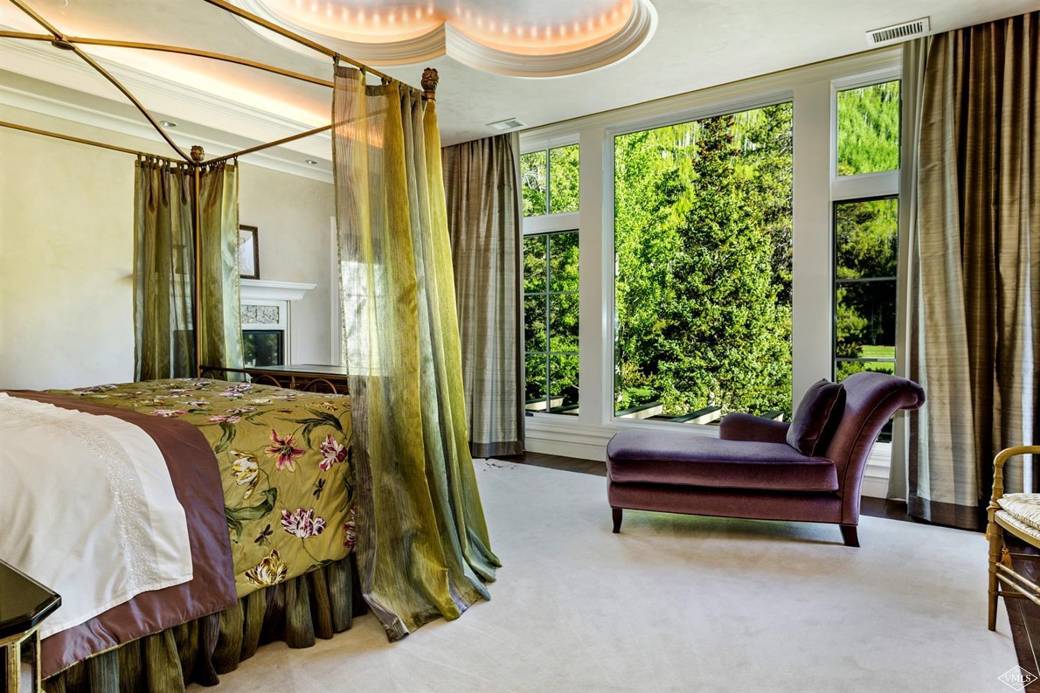 1109 Vail Valley Drive Vail, CO 81657 - Photo 15 of 25 a bedroom with a bed and a window