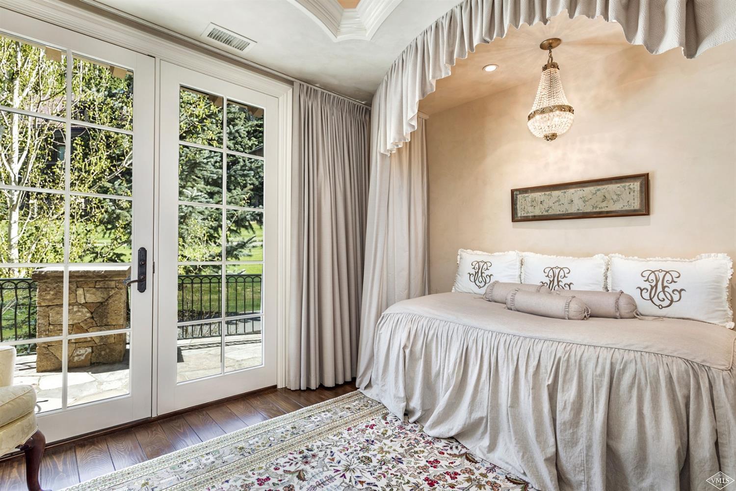 1109 Vail Valley Drive Vail, CO 81657 - Photo 16 of 25 a bedroom with a bed and a window