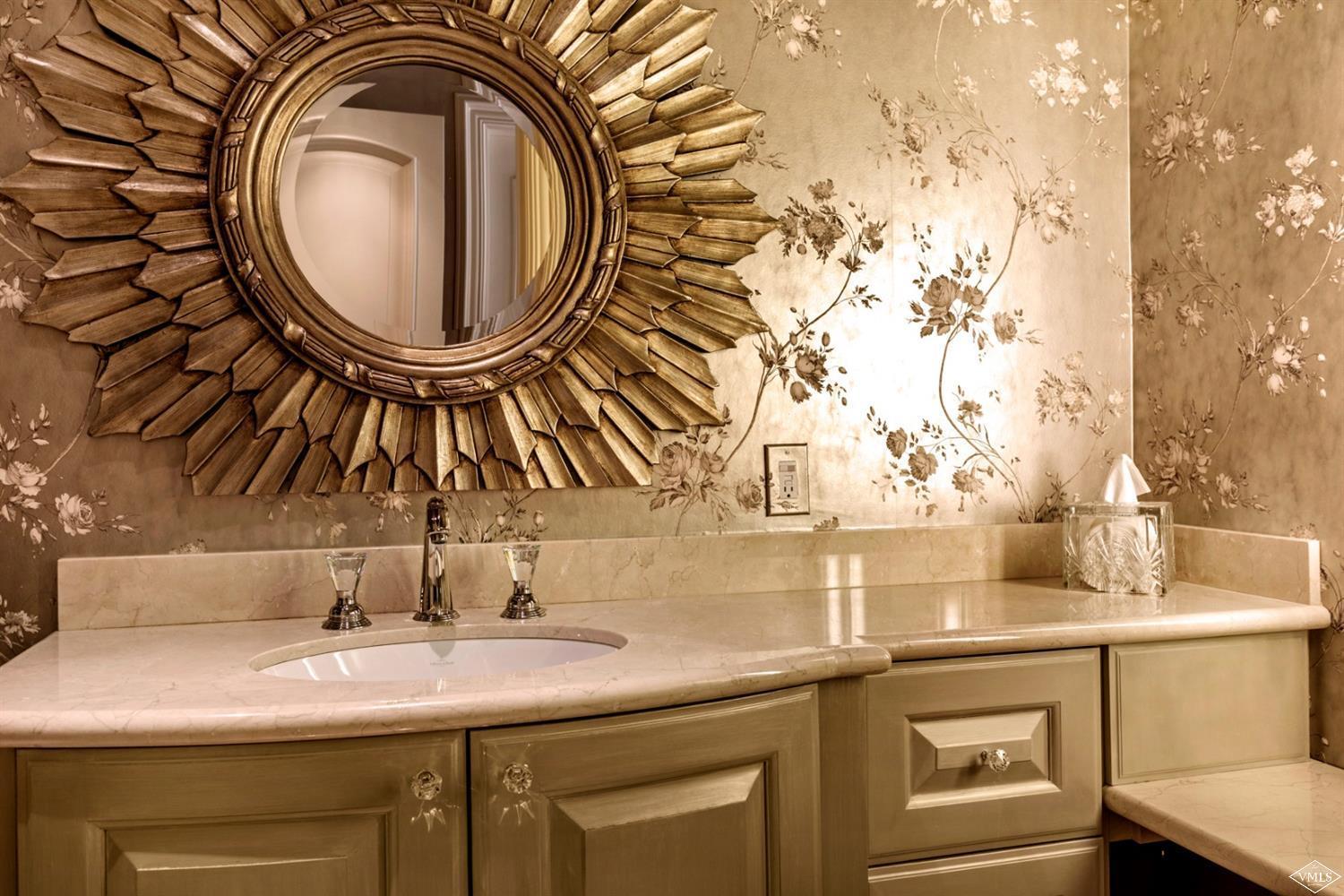 1109 Vail Valley Drive Vail, CO 81657 - Photo 17 of 25 a bathroom with a sink and a mirror