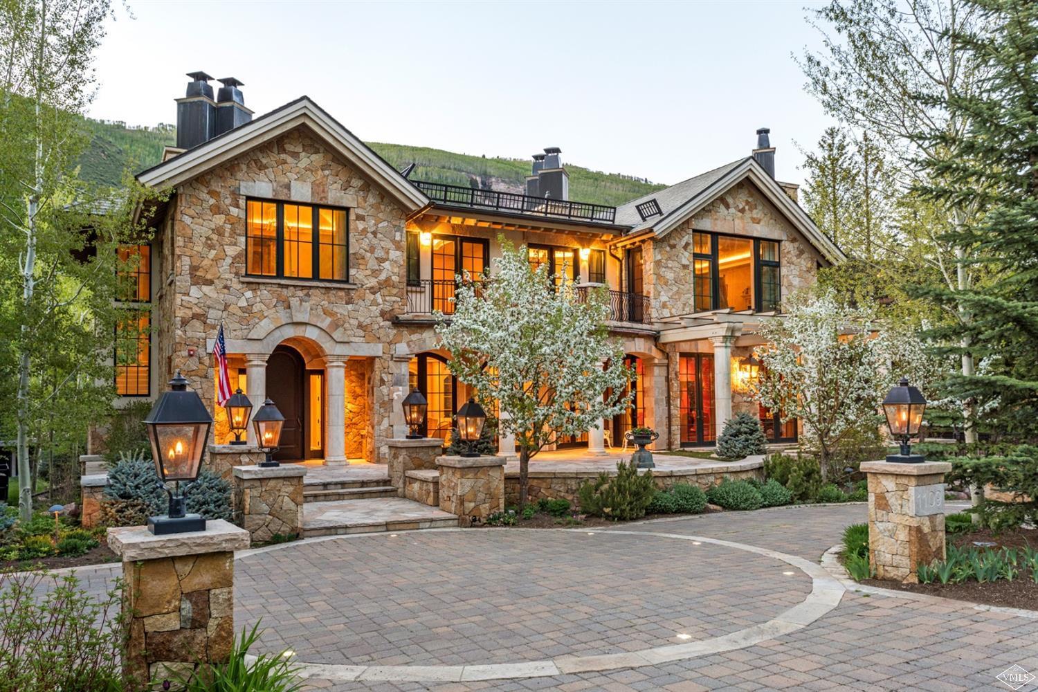 1109 Vail Valley Drive Vail, CO 81657 - Photo 2 of 25 a front view of a house with garden