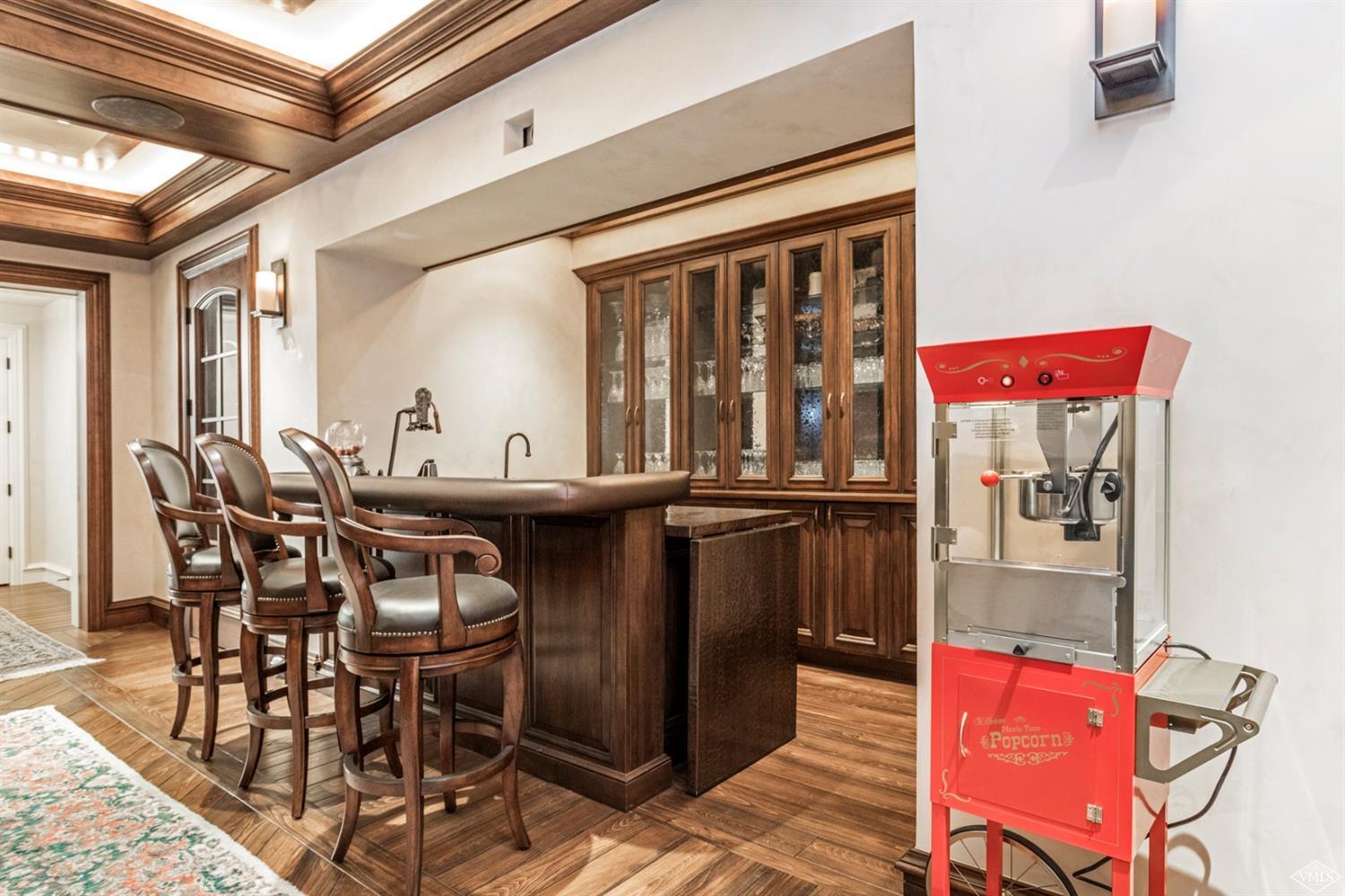 1109 Vail Valley Drive Vail, CO 81657 - Photo 23 of 25 a view of a dining room with furniture window and wooden floor