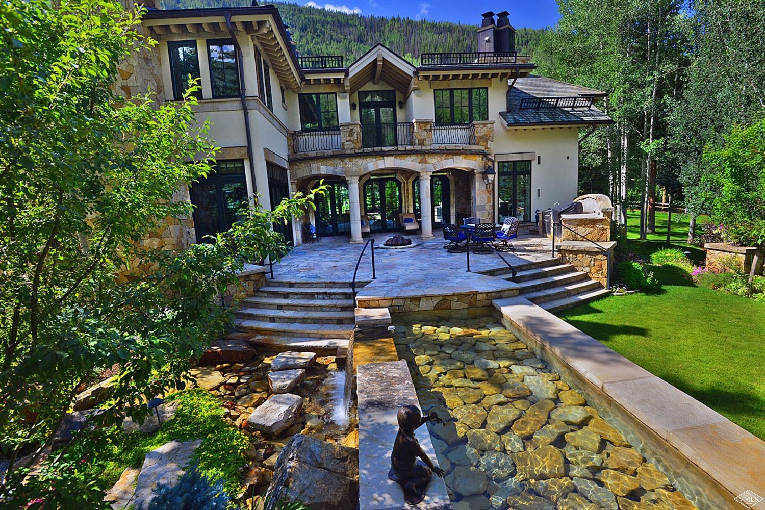 1109 Vail Valley Drive Vail, CO 81657 - Photo 24 of 25 a front view of house with yard and green space