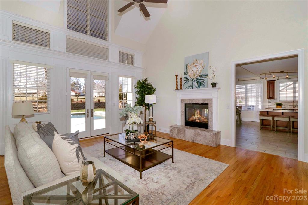120 Sink Farm Road Mooresville, NC 28115 - Photo 12 of 46 a living room with furniture and a fireplace