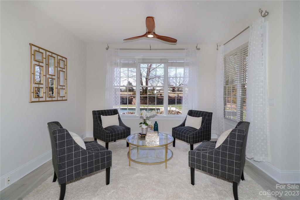 120 Sink Farm Road Mooresville, NC 28115 - Photo 19 of 46 a living room with furniture and a large window