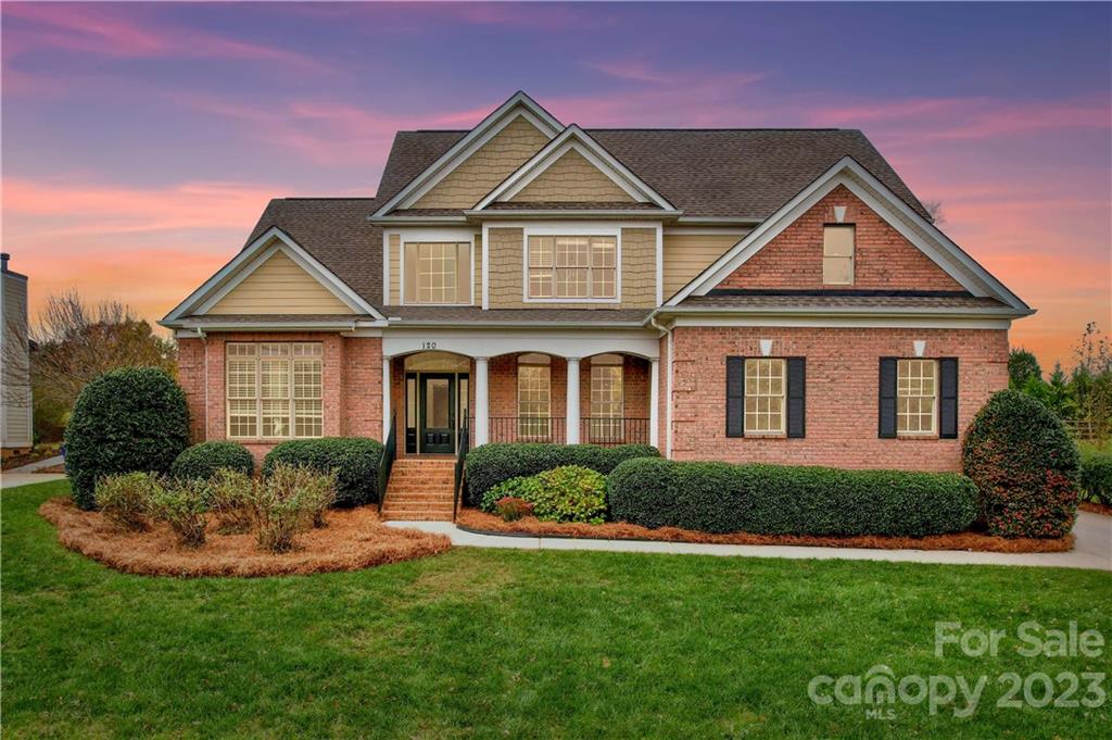 120 Sink Farm Road Mooresville, NC 28115 - Photo 2 of 46 a front view of a house with a yard and green space
