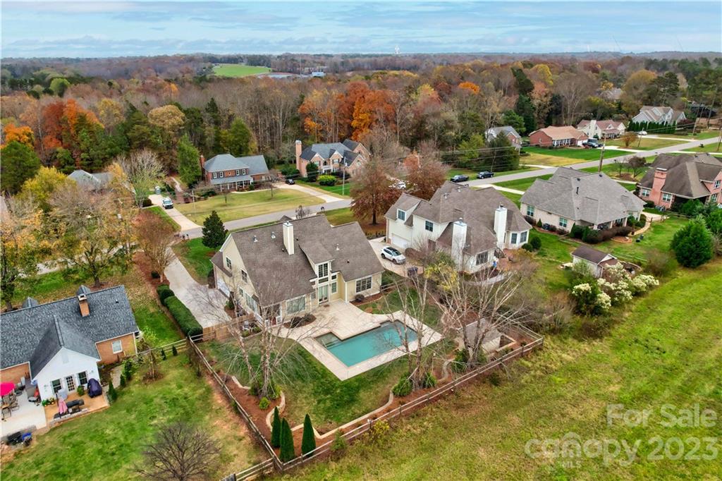 120 Sink Farm Road Mooresville, NC 28115 - Photo 33 of 46 an aerial view of residential house with outdoor space and lake view