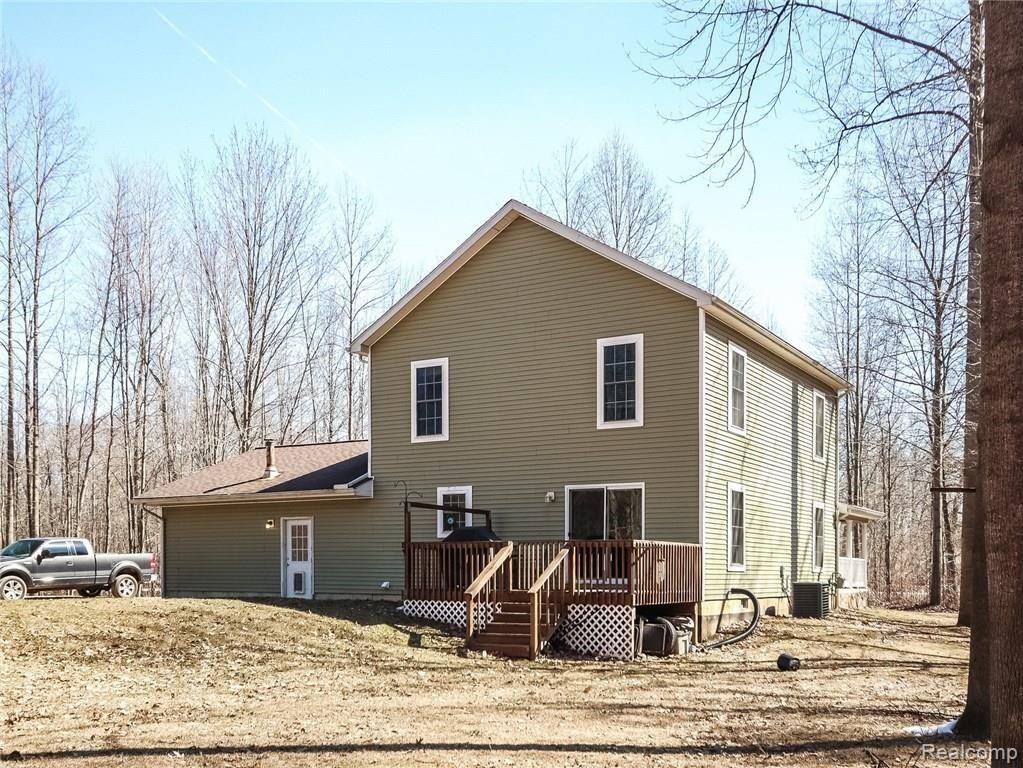 20972 Elwell Road Belleville, MI 48111 - Photo 43 of 51 045-Rear_View-5468036-medium4x3.jpg