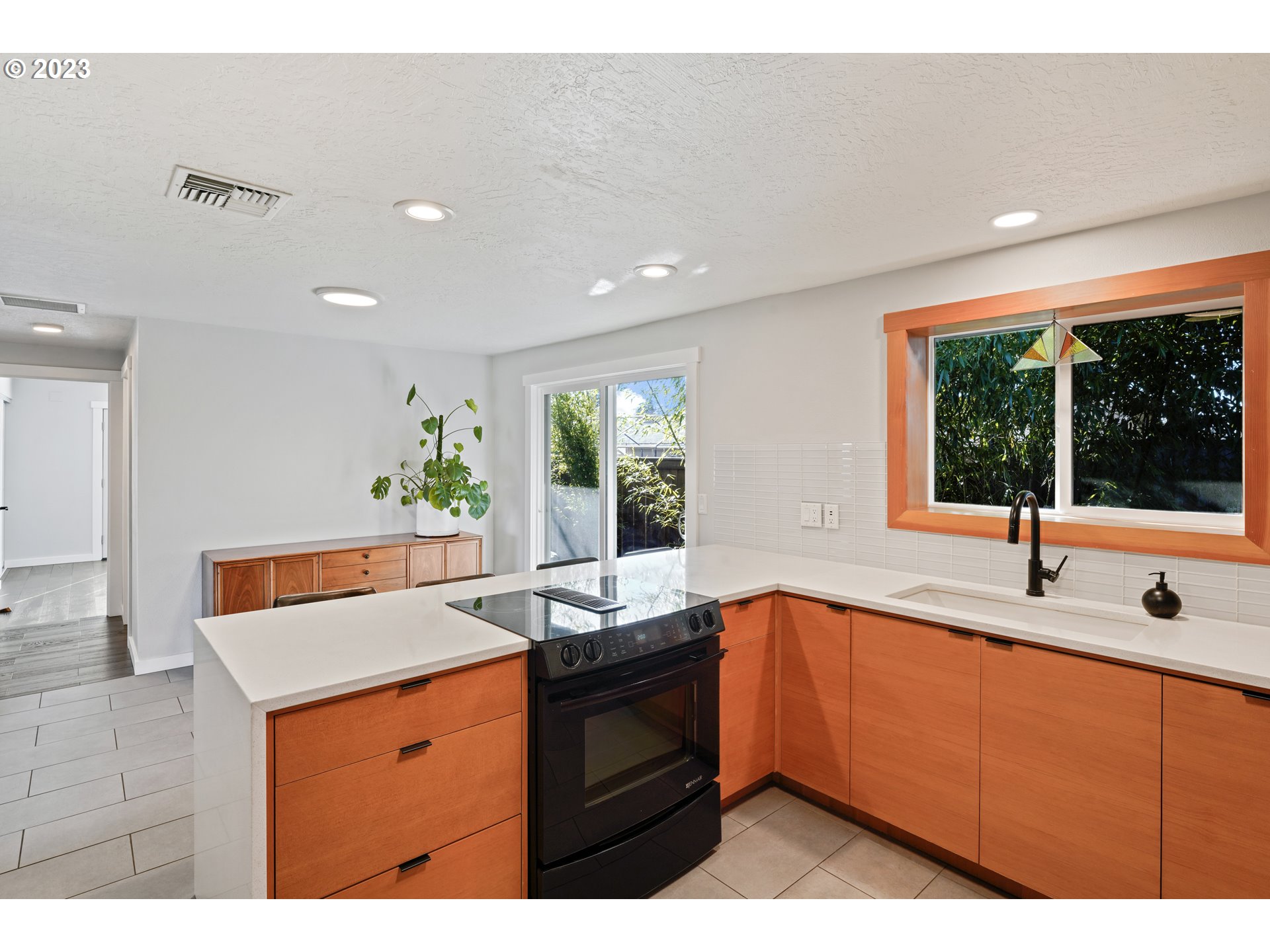 2180 9th Street Springfield, OR 97477 - Photo 8 of 32 a kitchen with a sink and large window